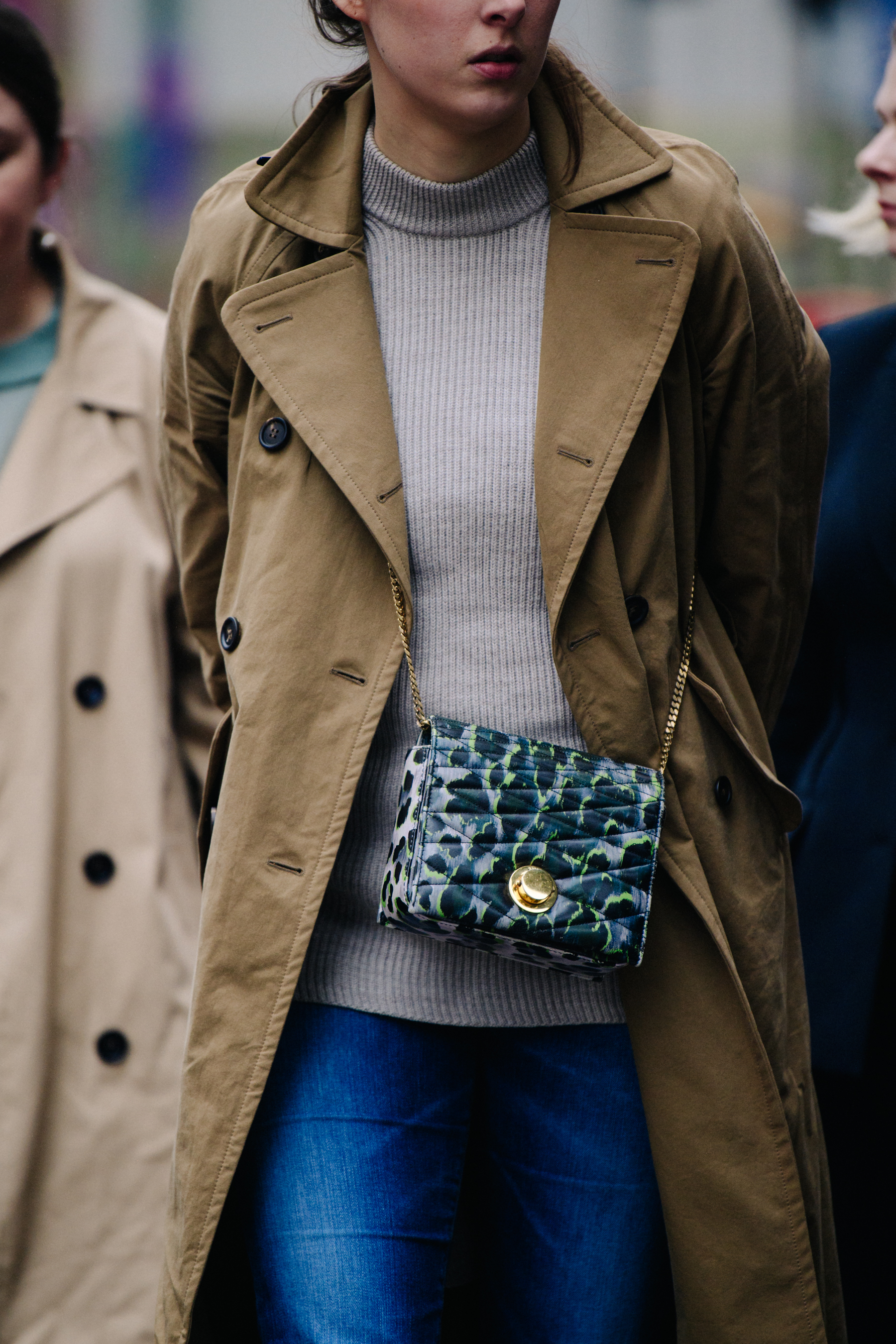 Woman wearing small colourful bag