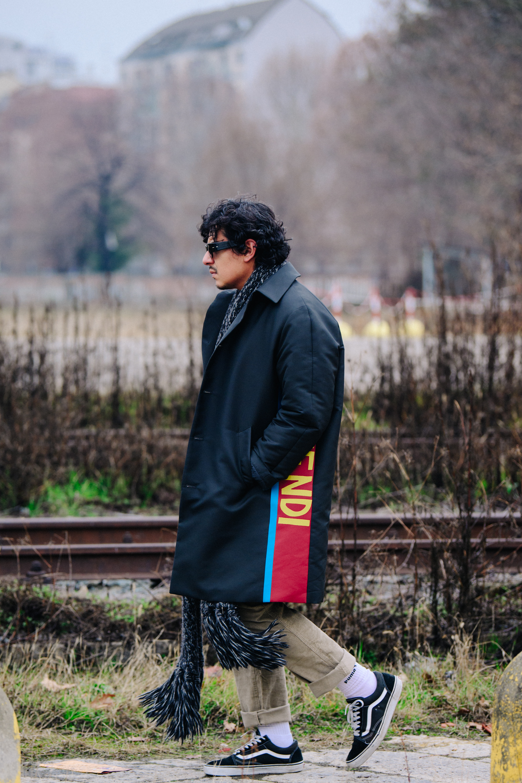 Man wearing long Fendi coat