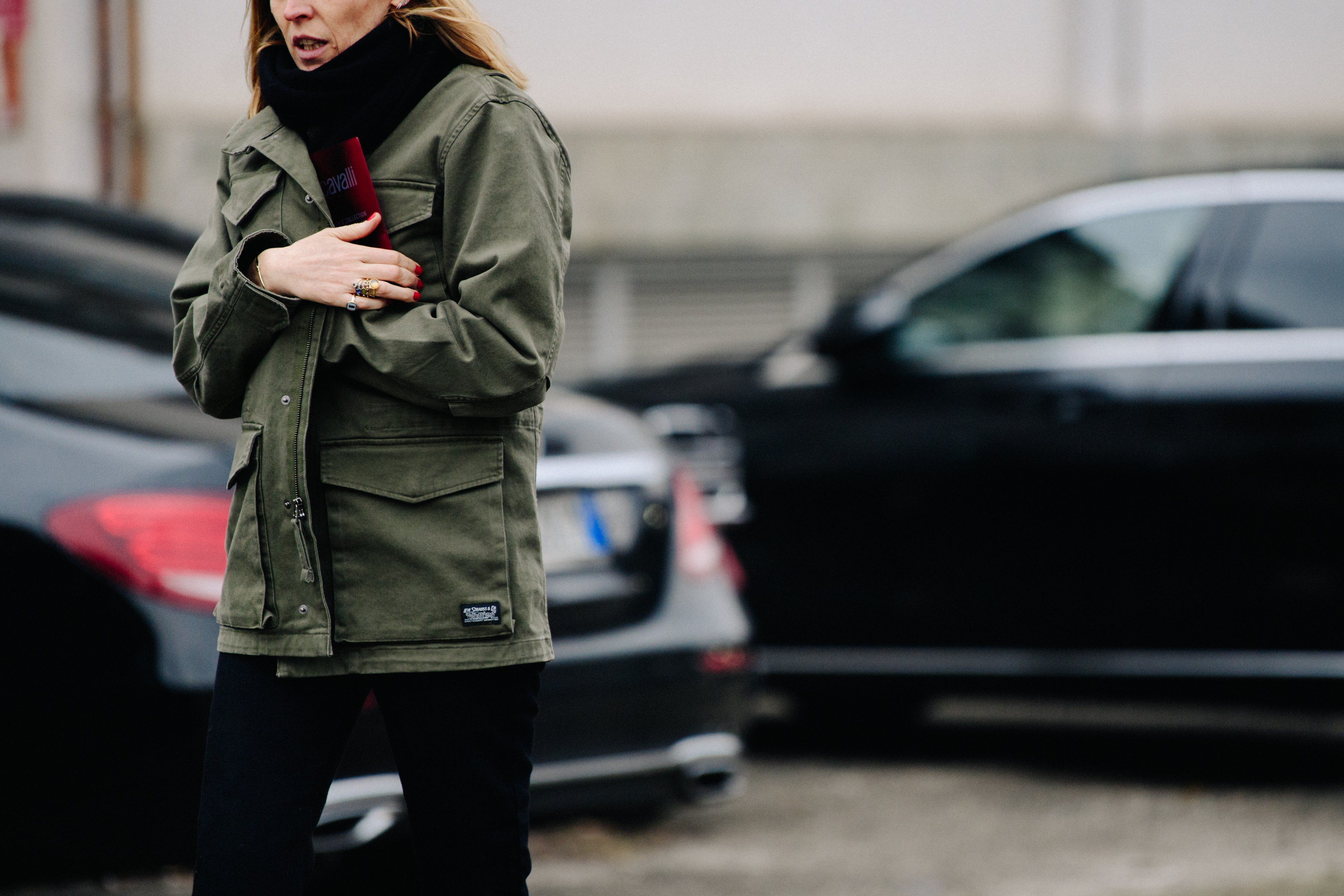 Woman wearing military style jacket