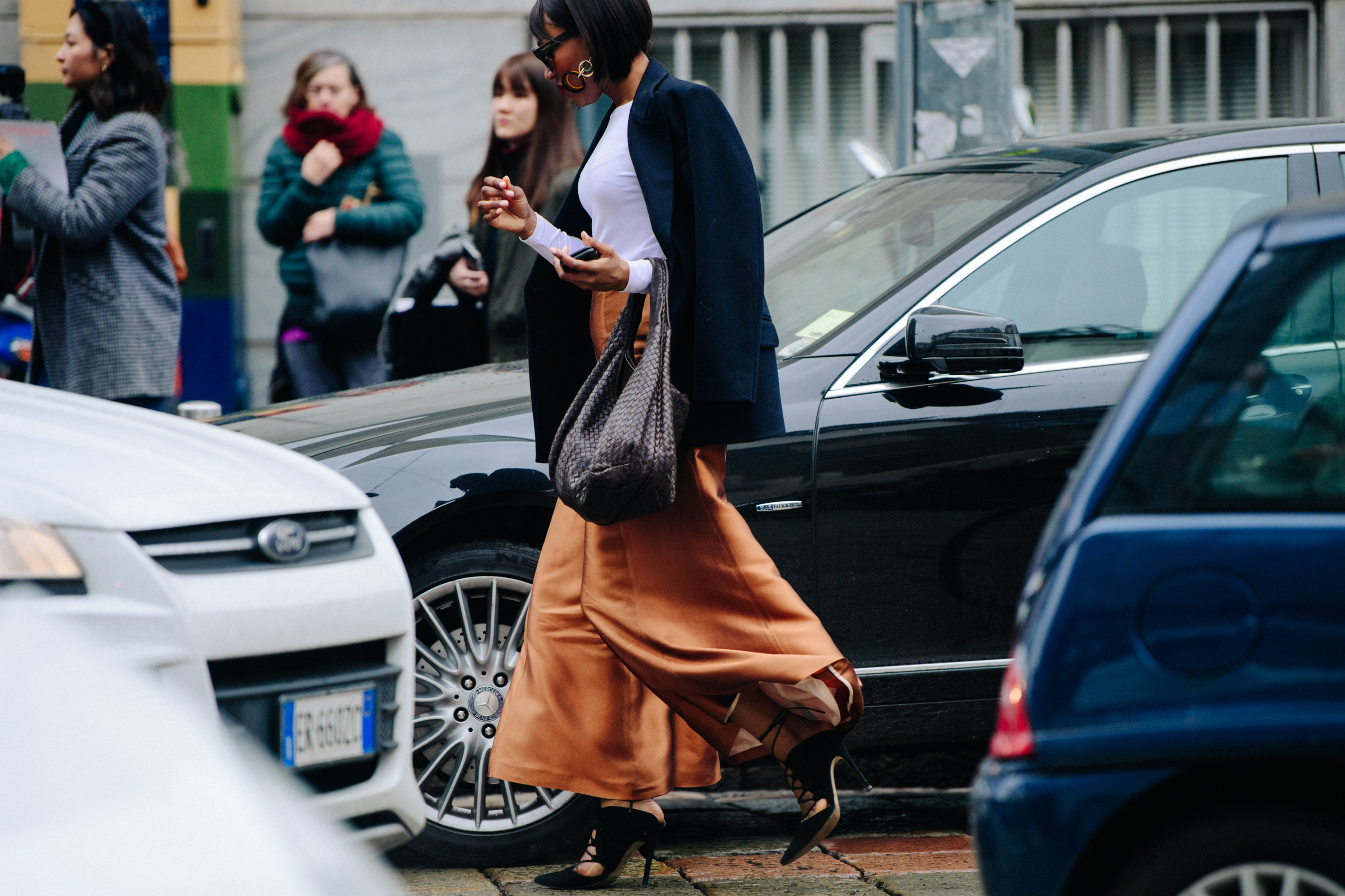 Woman wearing wide brown trousers