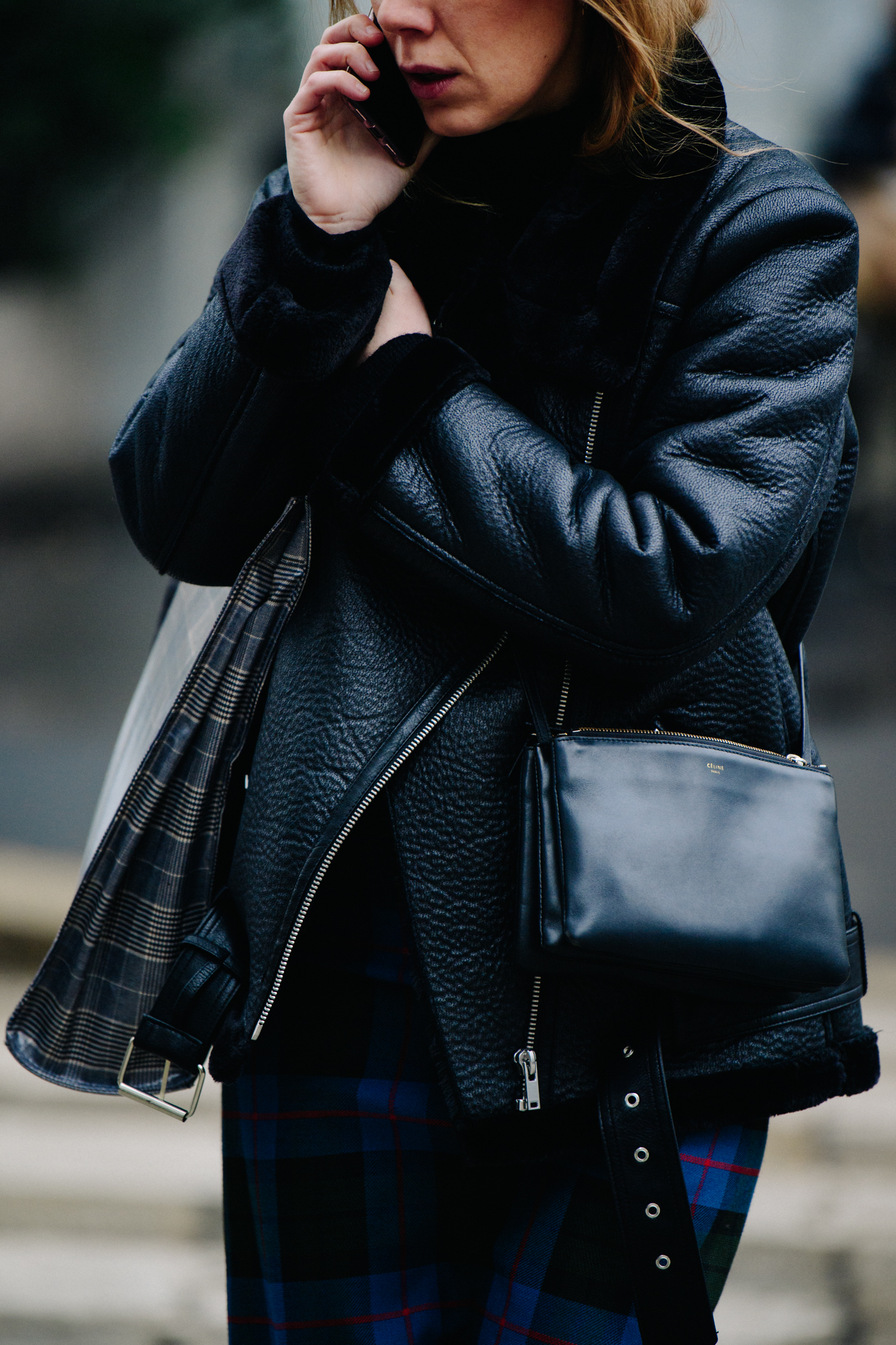 Woman wearing black leather jacket