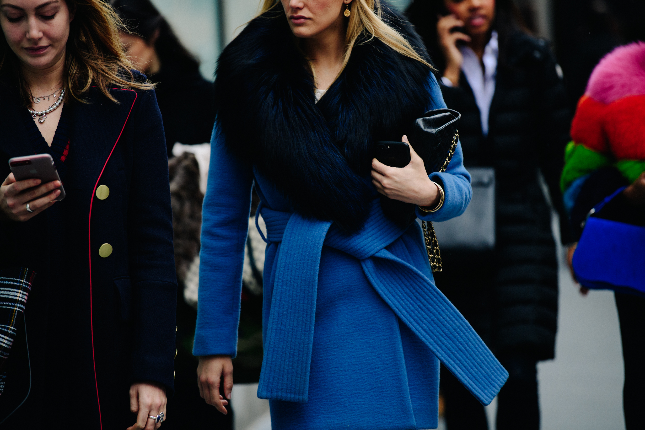 Woman wearing fur collar coat