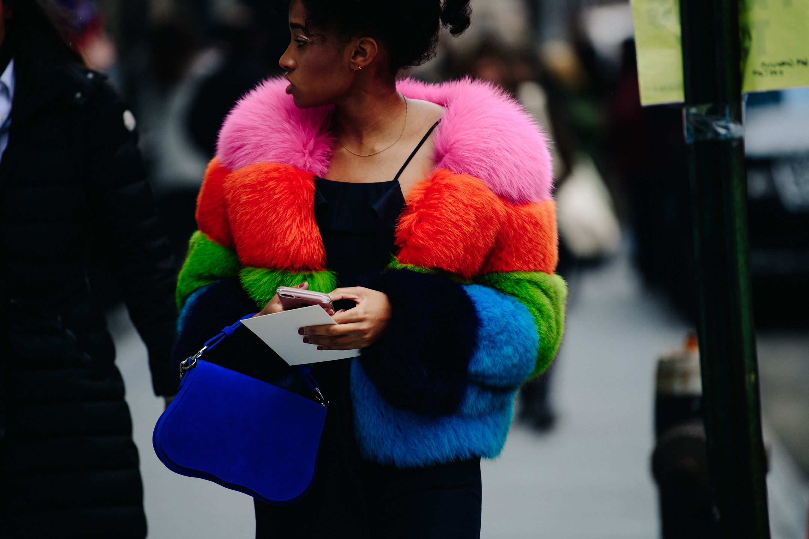 Buyer wearing colourful fur jacket