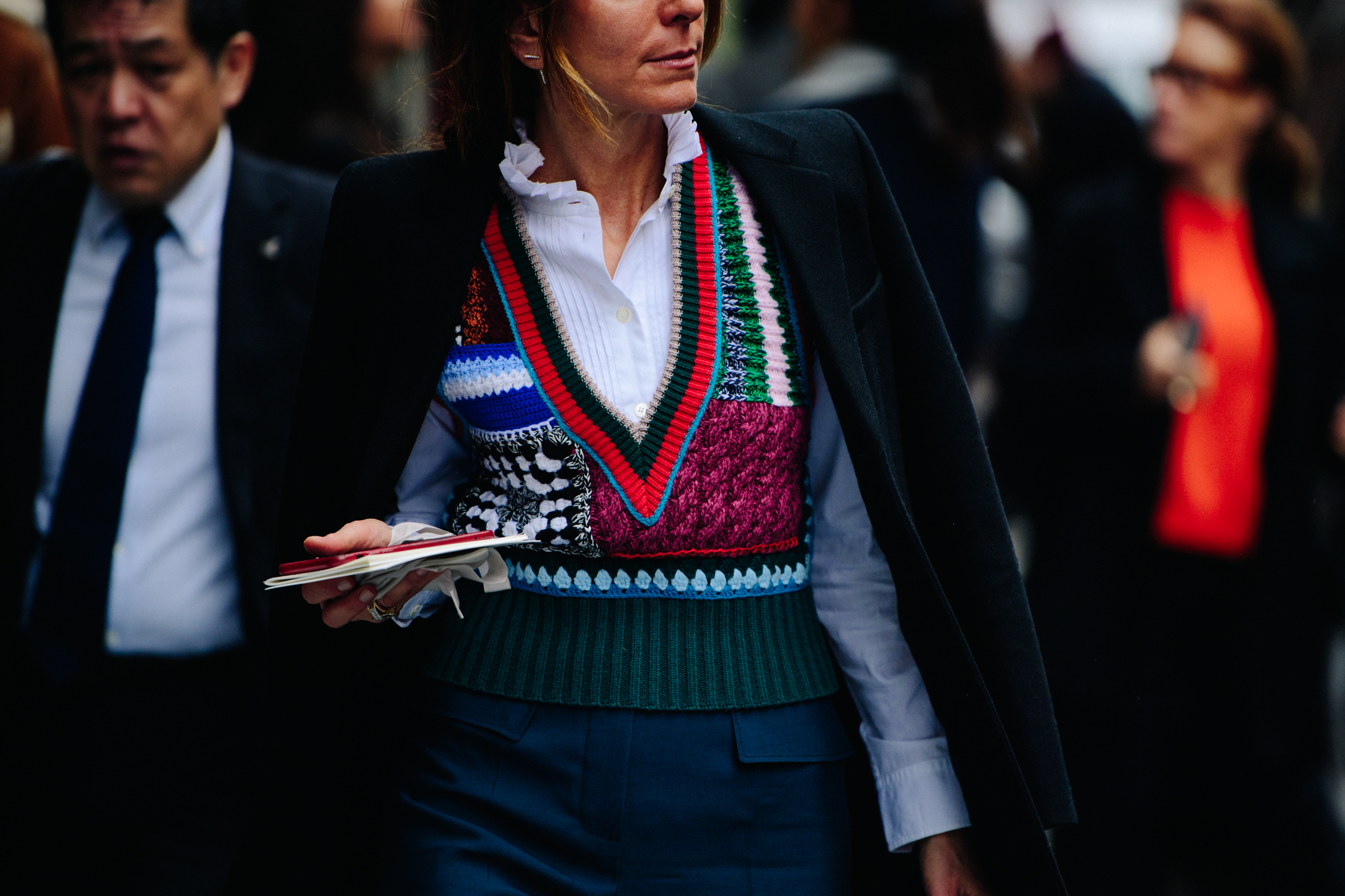 Woman wearing knitted jumper