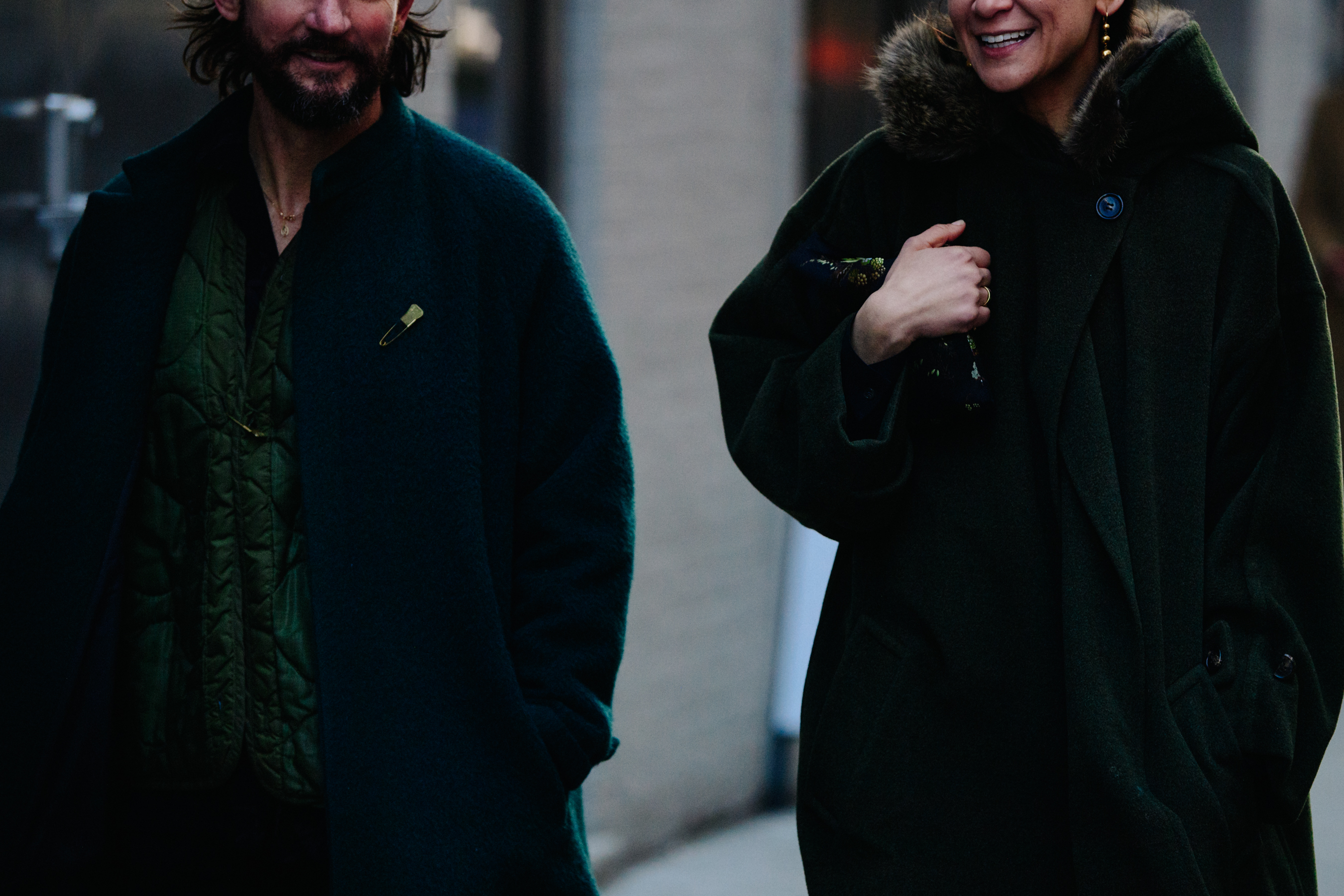 Couple wearing thick winter coats