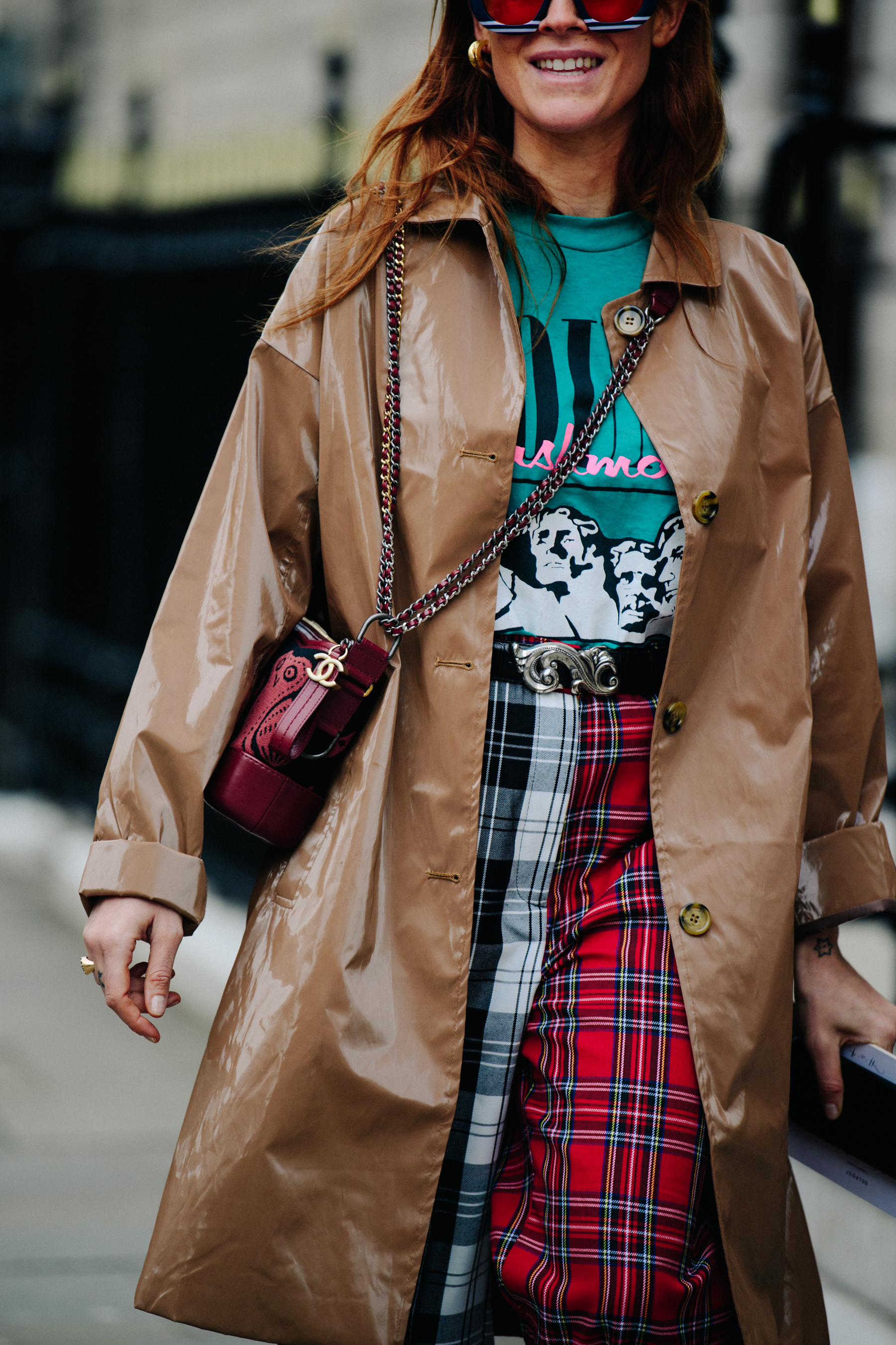 Woman carrying red Chanel bag