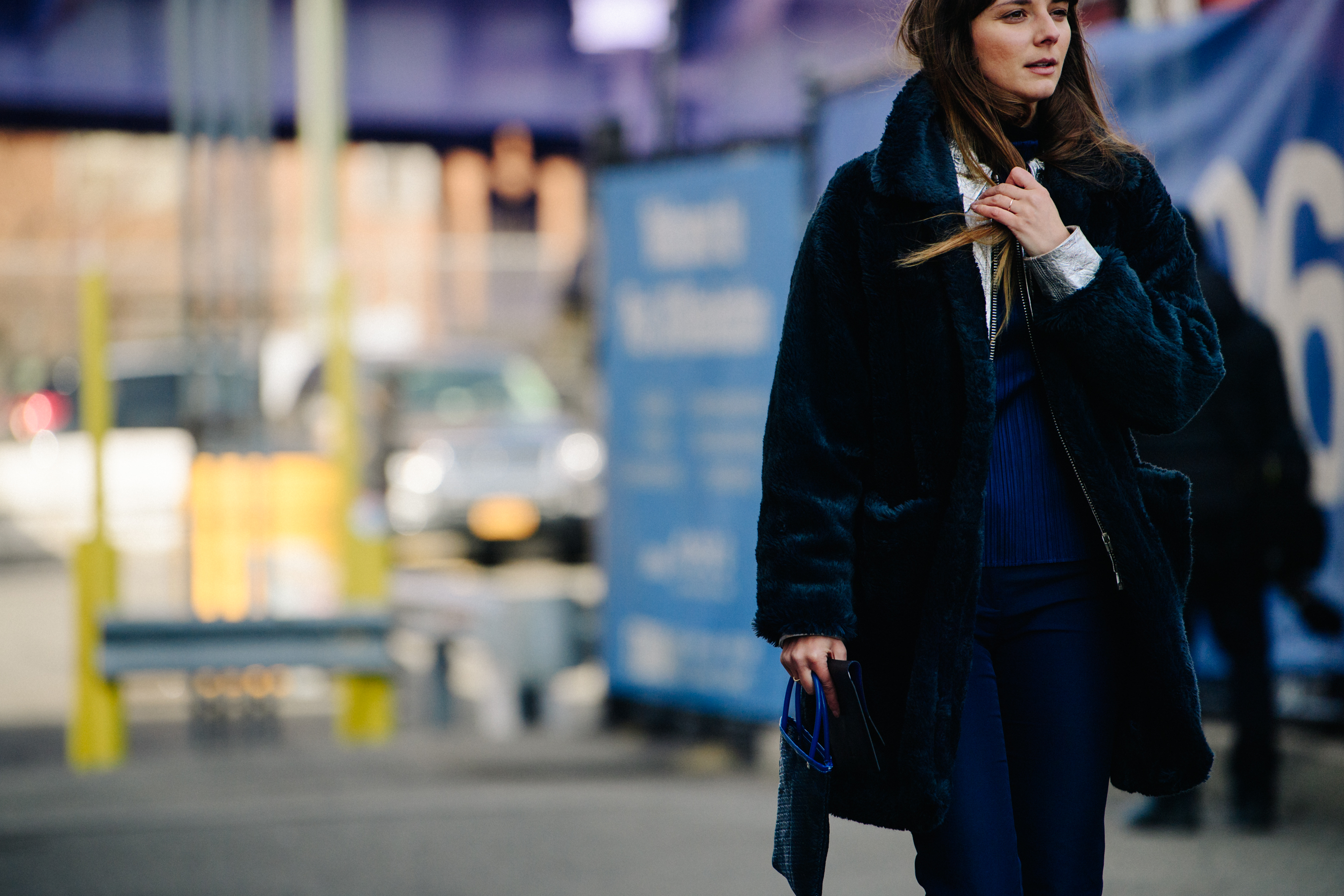 Woman wearing dark fur coat