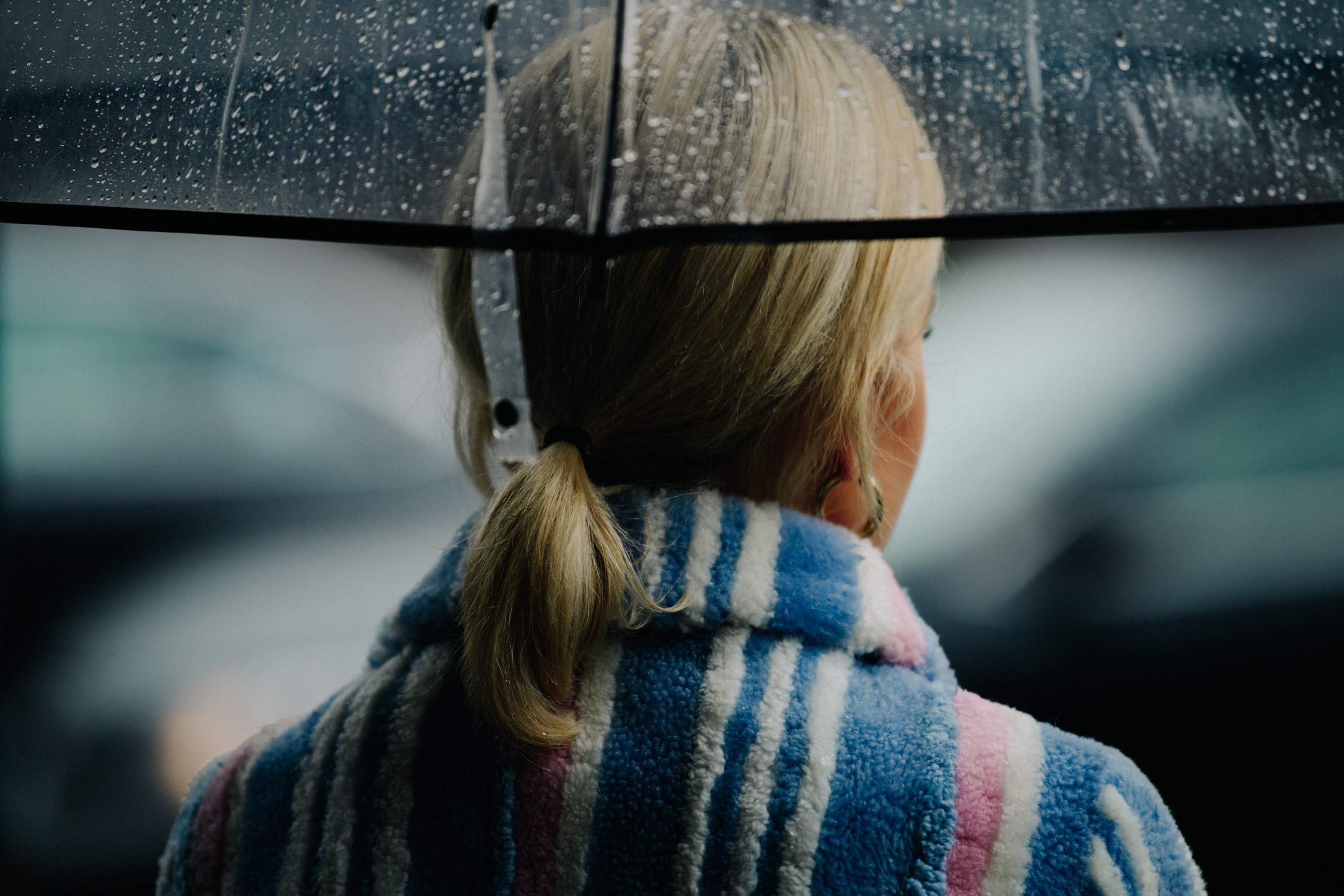 German blogger holding umbrella