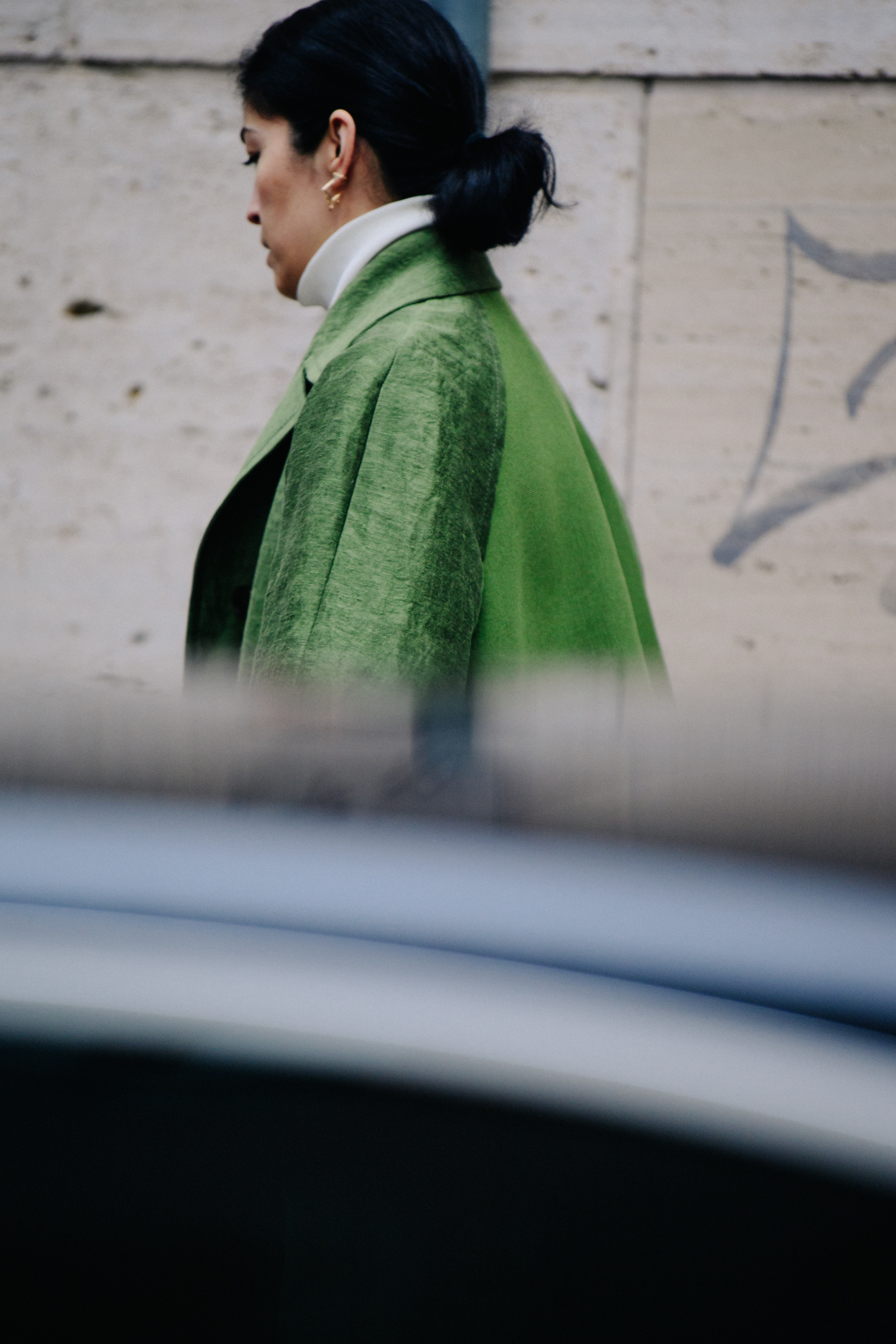 Woman wearing green coat