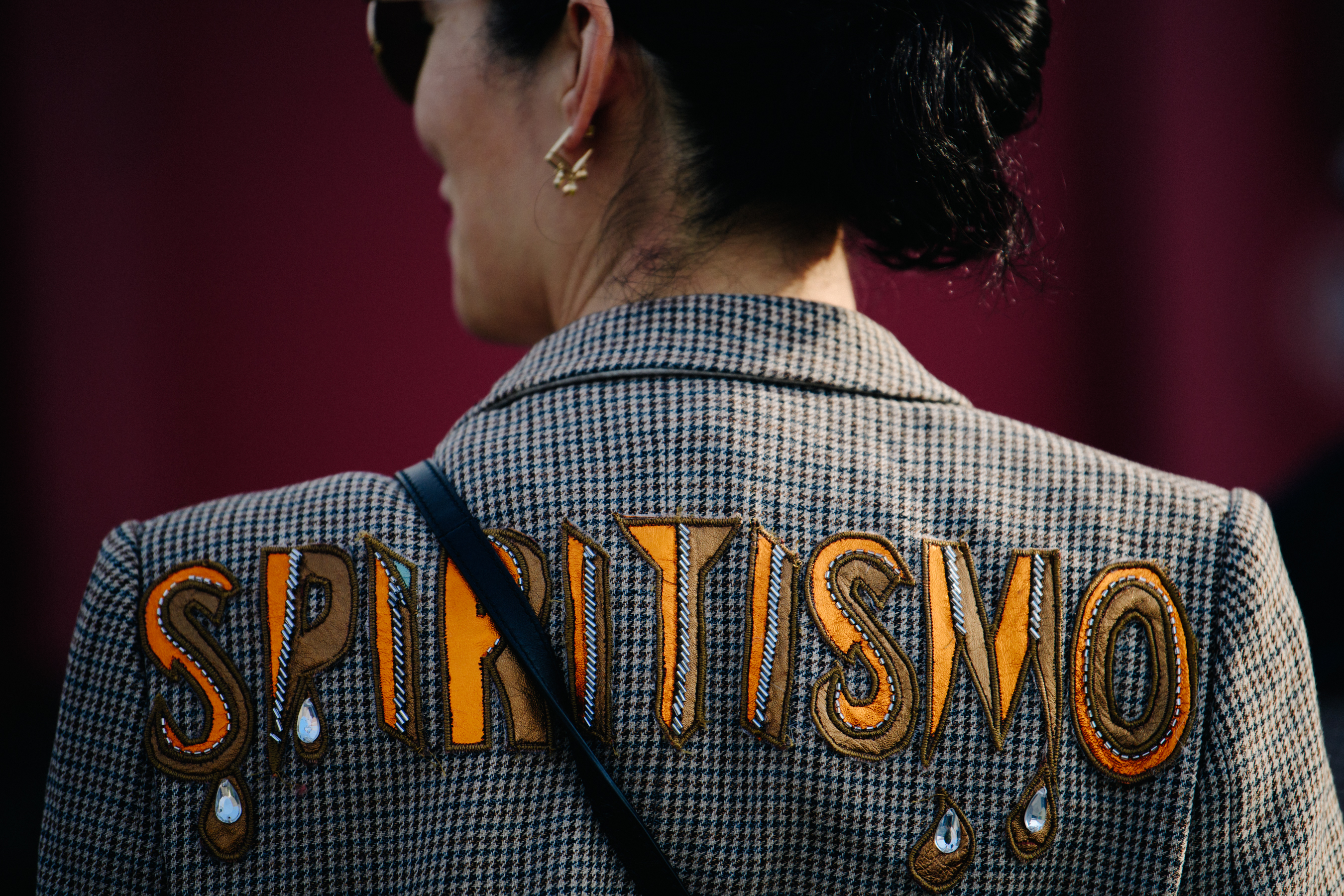 Woman wearing back stitched jacket