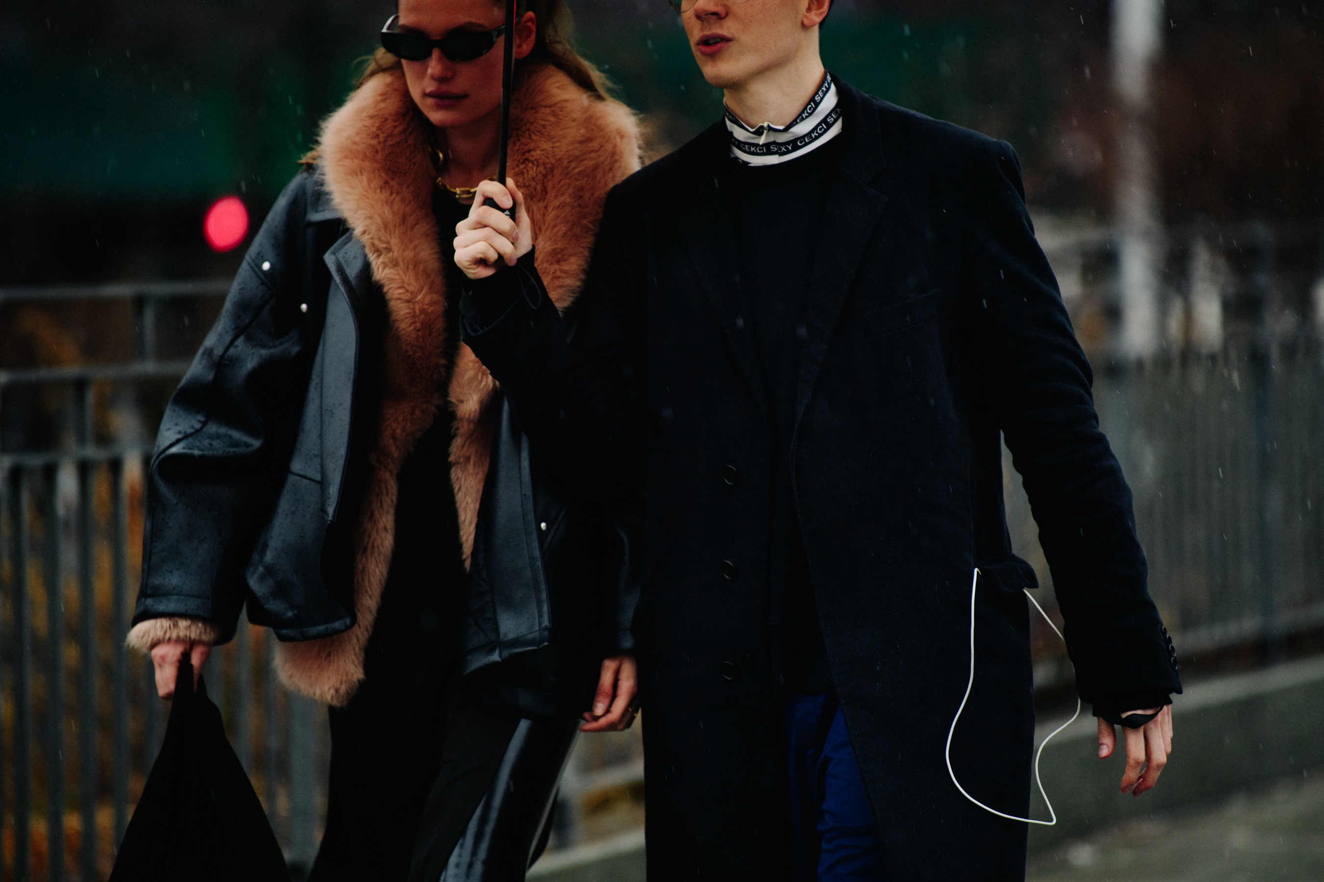 Couple wearing black coats