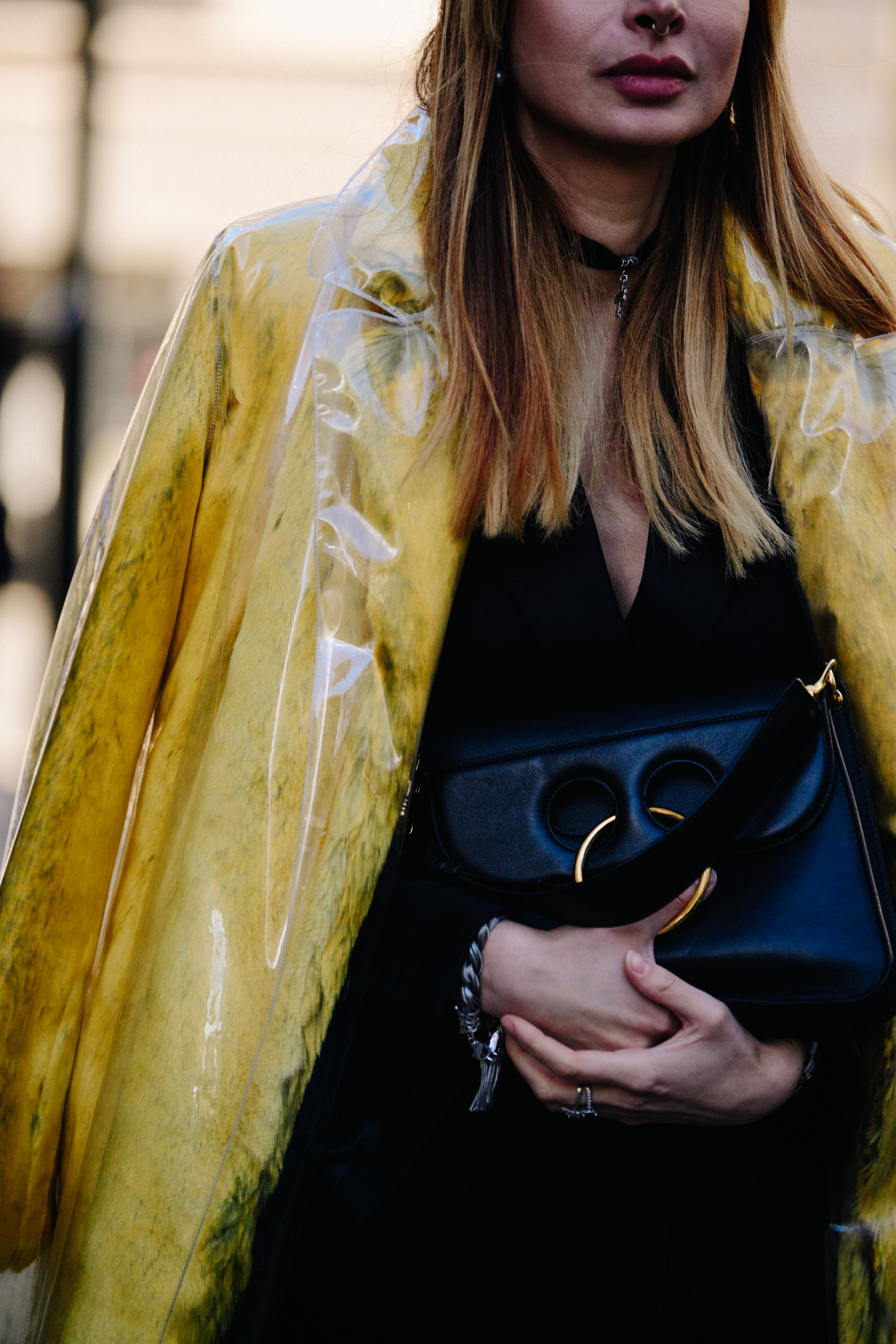 Woman carrying JW Anderson purse