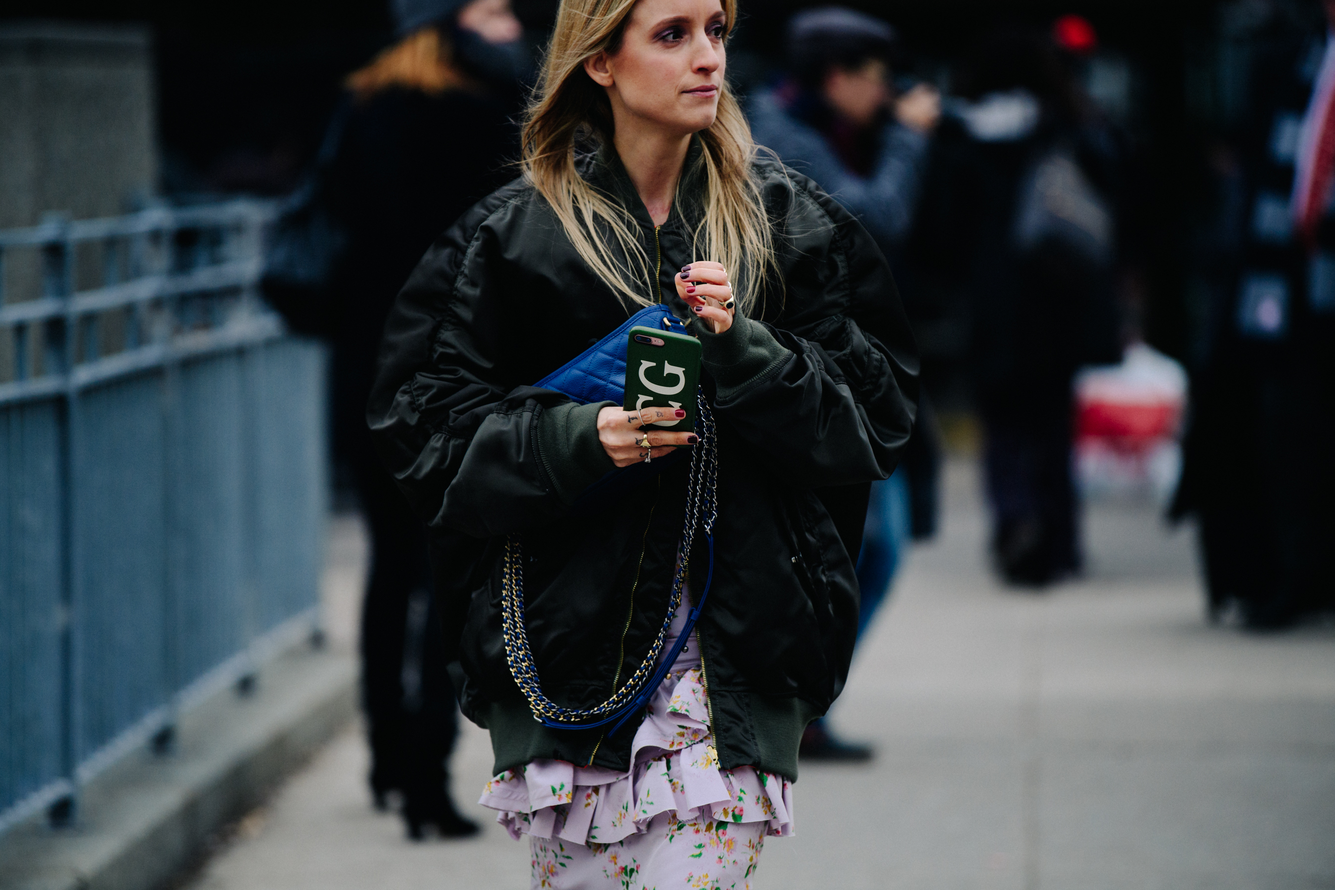 Blogger wearing pink floral dress