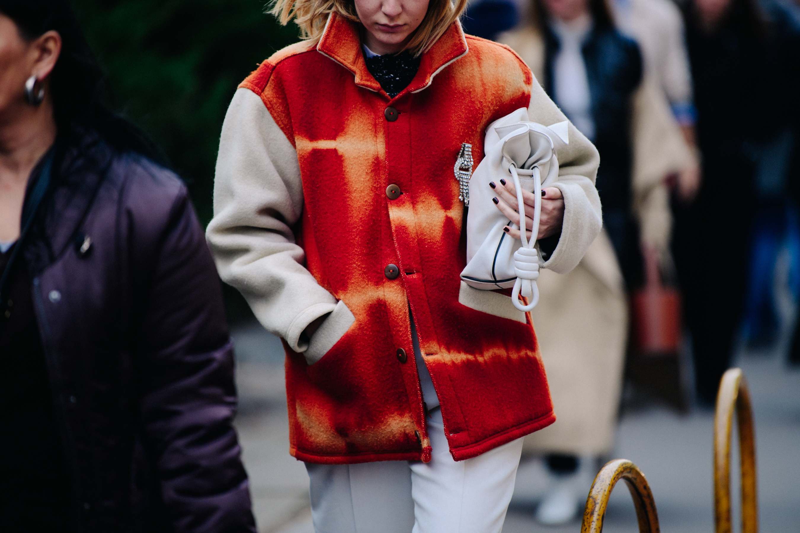 Italian blogger wearing red and white wool coat