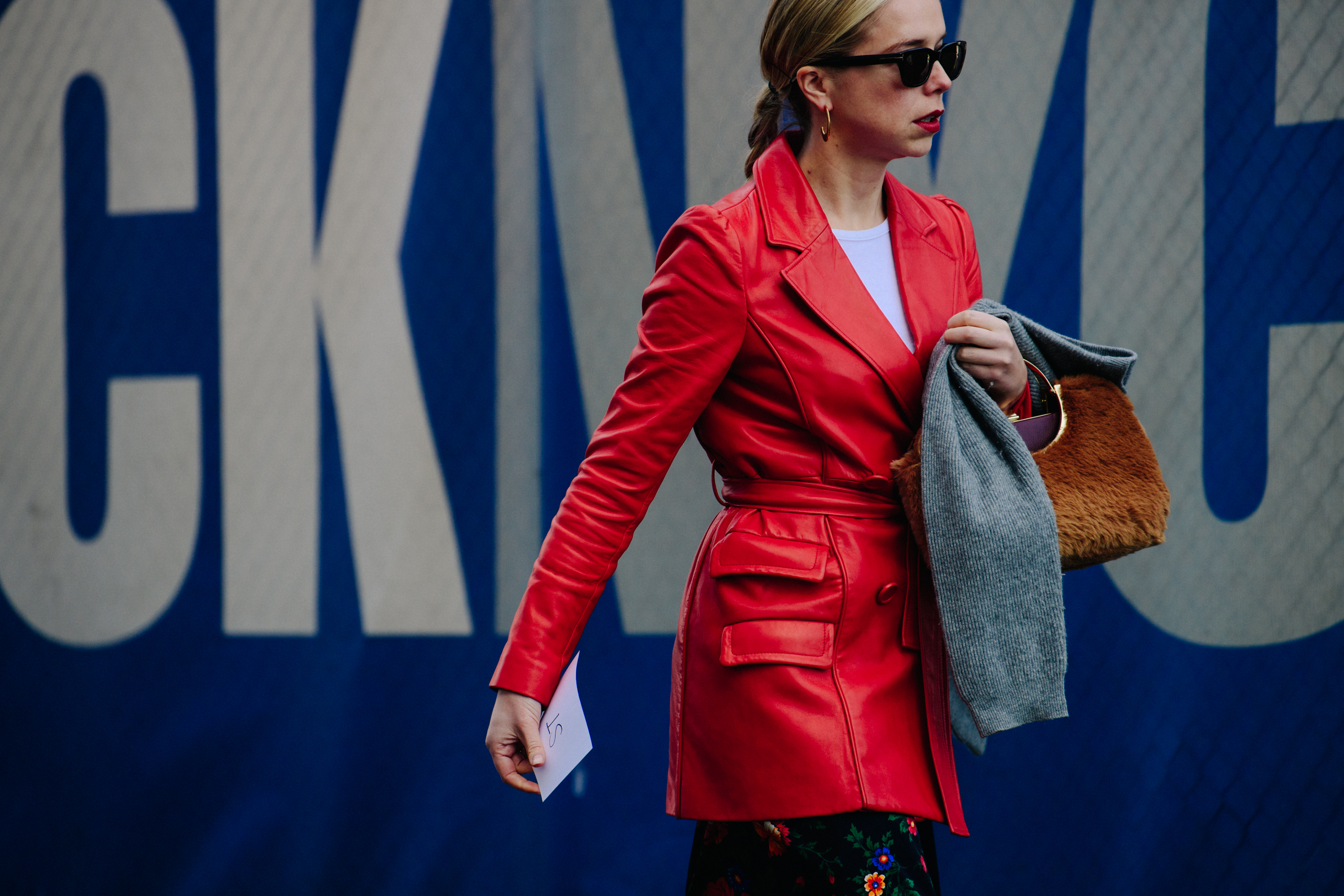 Woman wearing red leather jacket