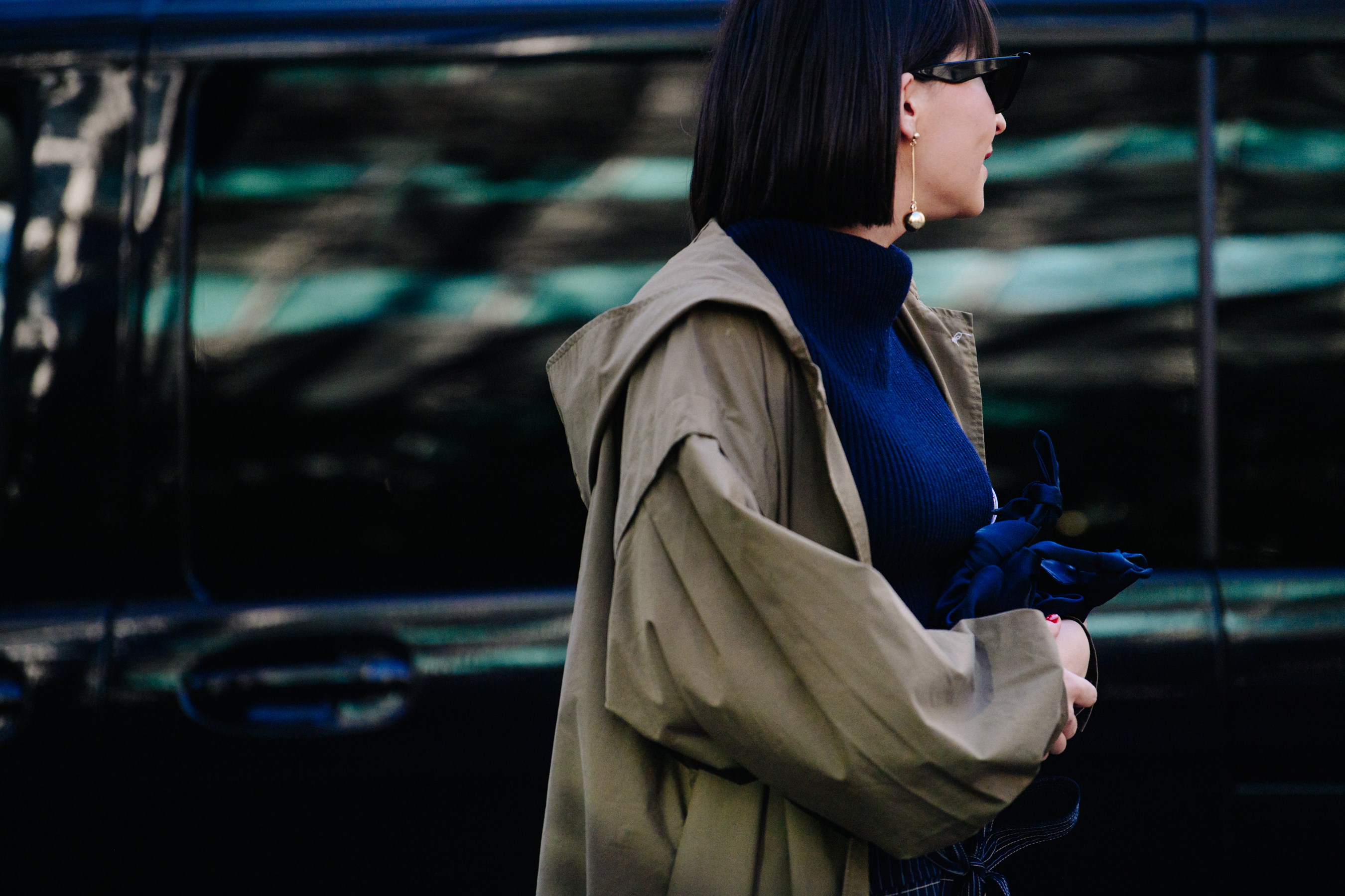 Woman wearing blue knit sweater