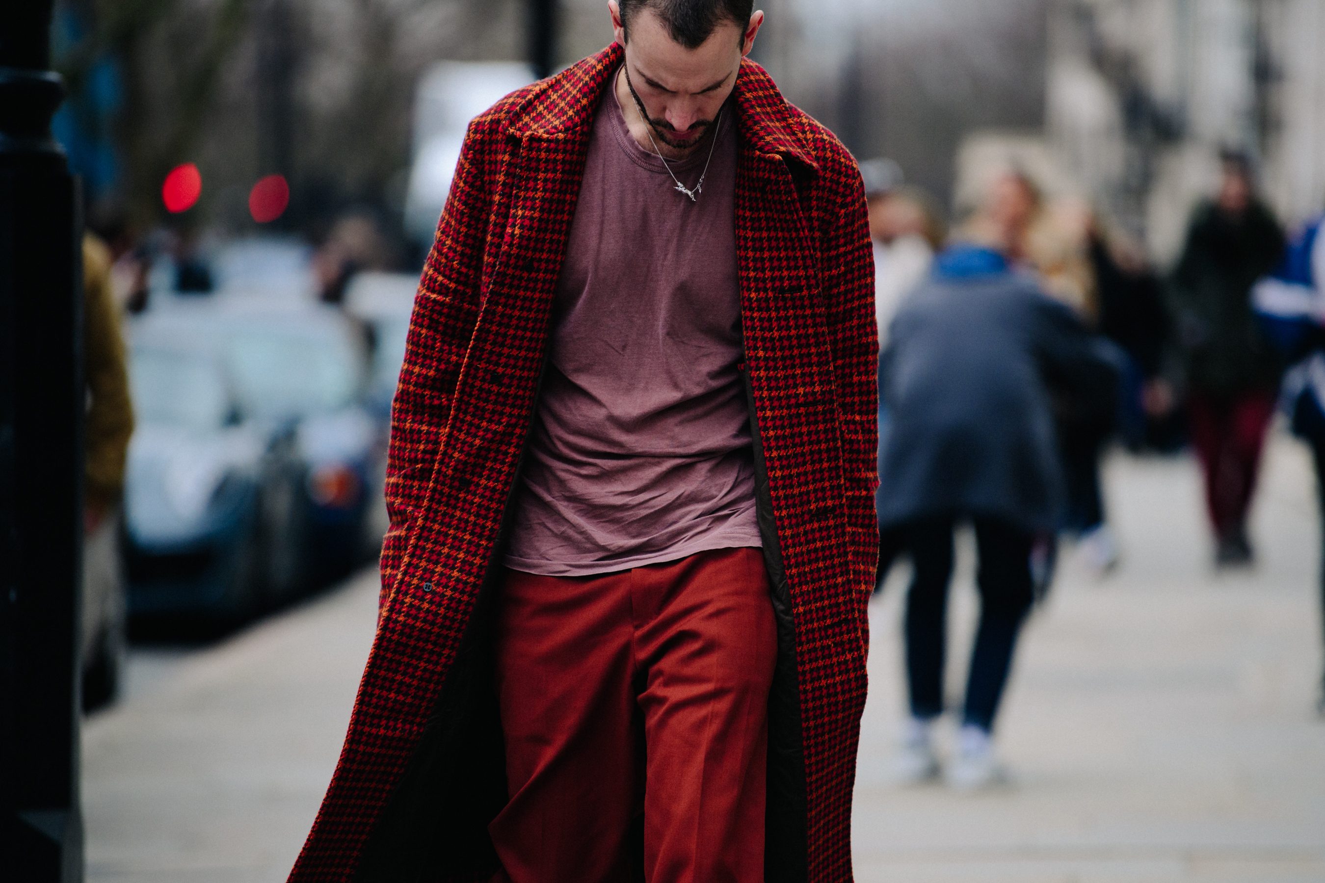 Editor wearing red outfit