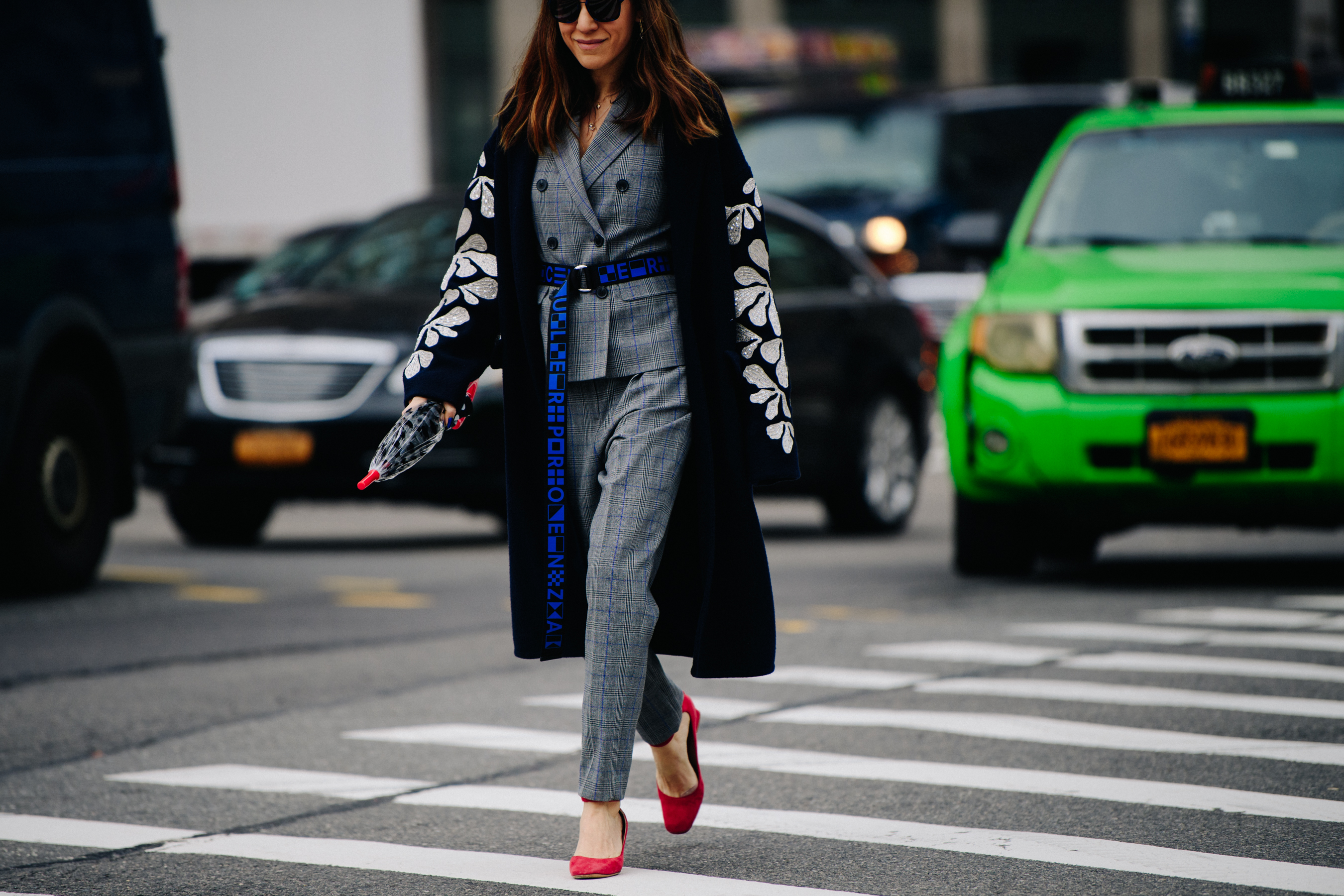 Woman wearing long blue belt