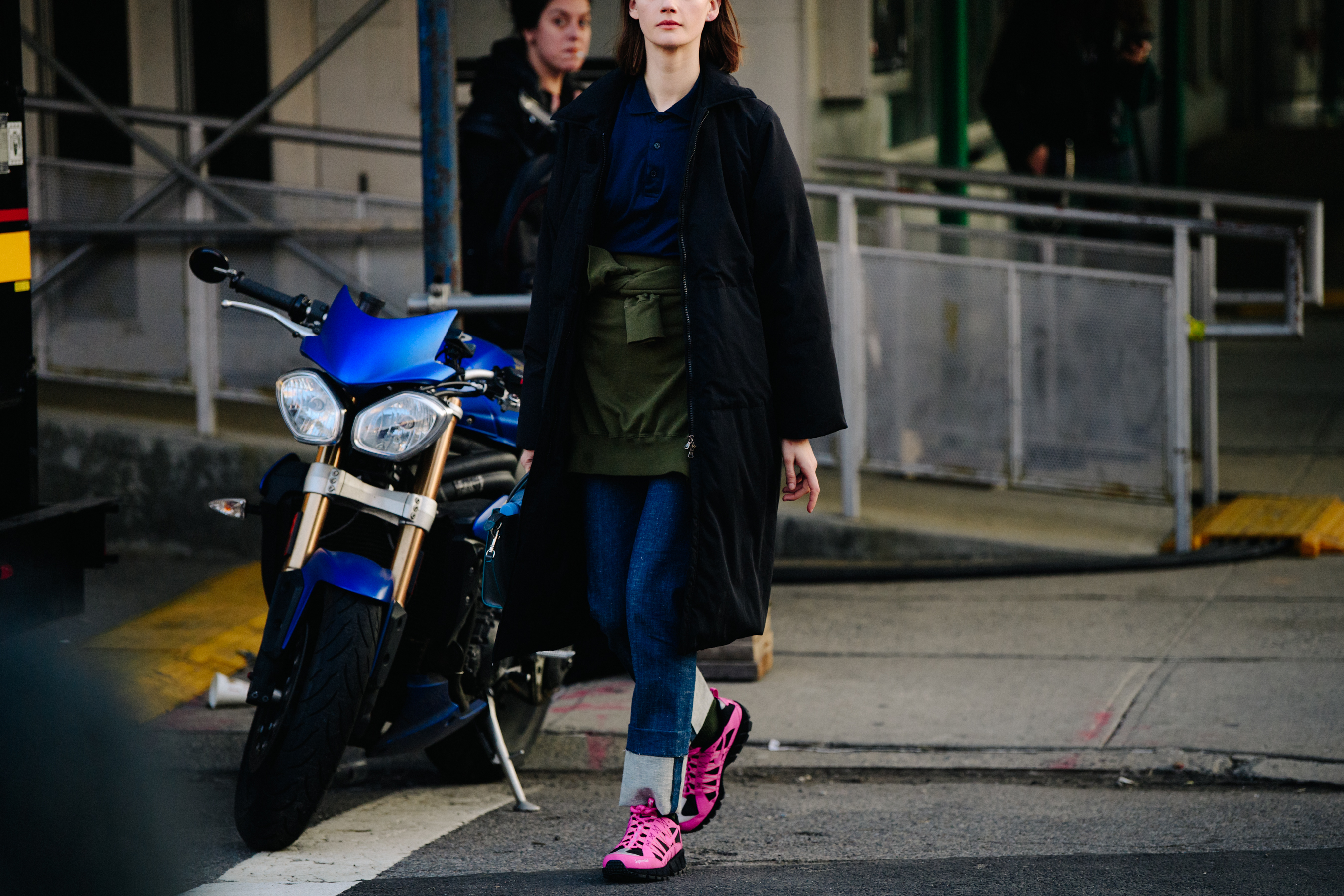 Model wearing pink sneakers