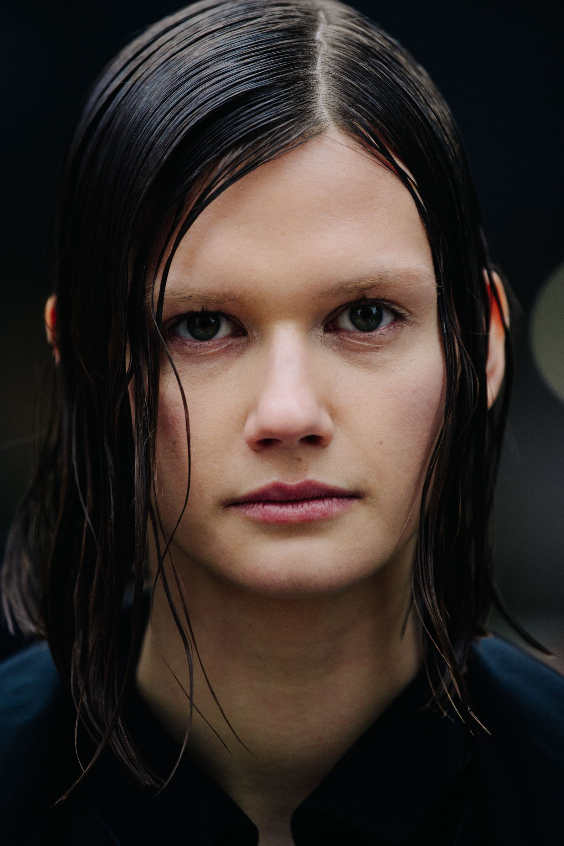 Portrait of model with long wet hair