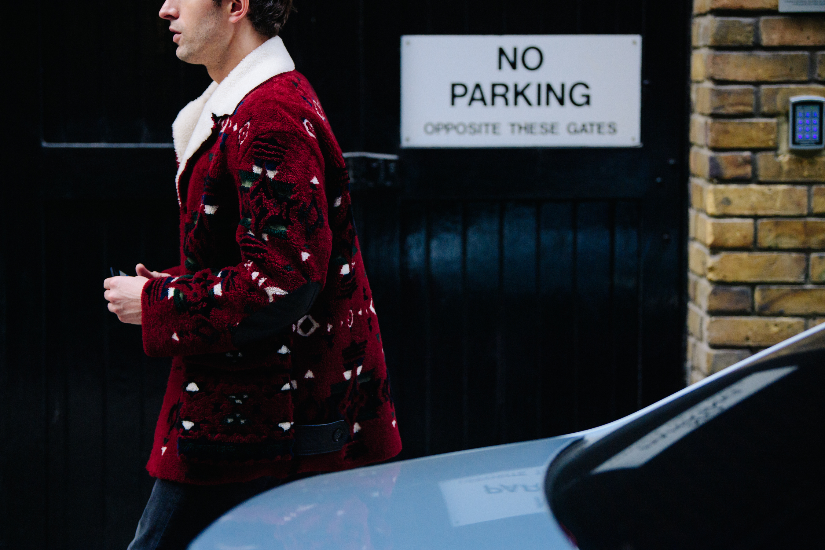 Man wearing red pattern jacket