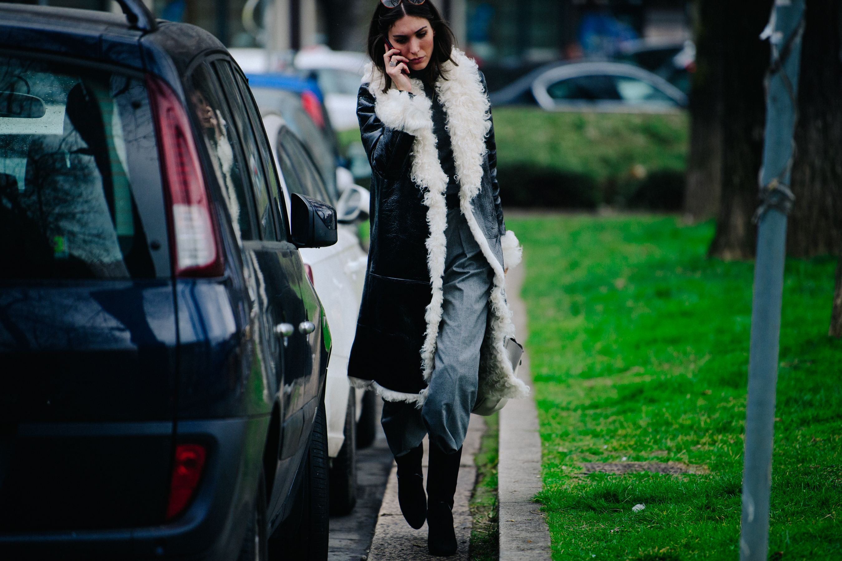 Italian blogger wearing black and white coat