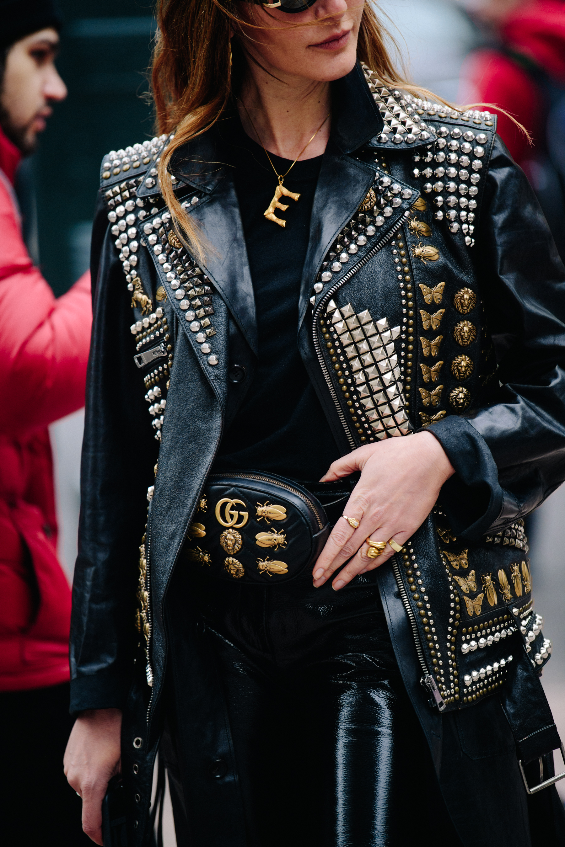 Woman wearing studded leather jacket