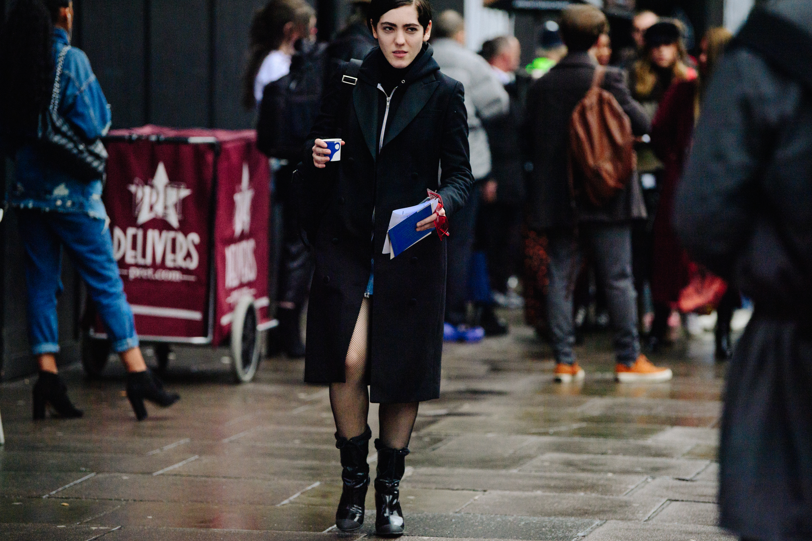 British editor wearing all black