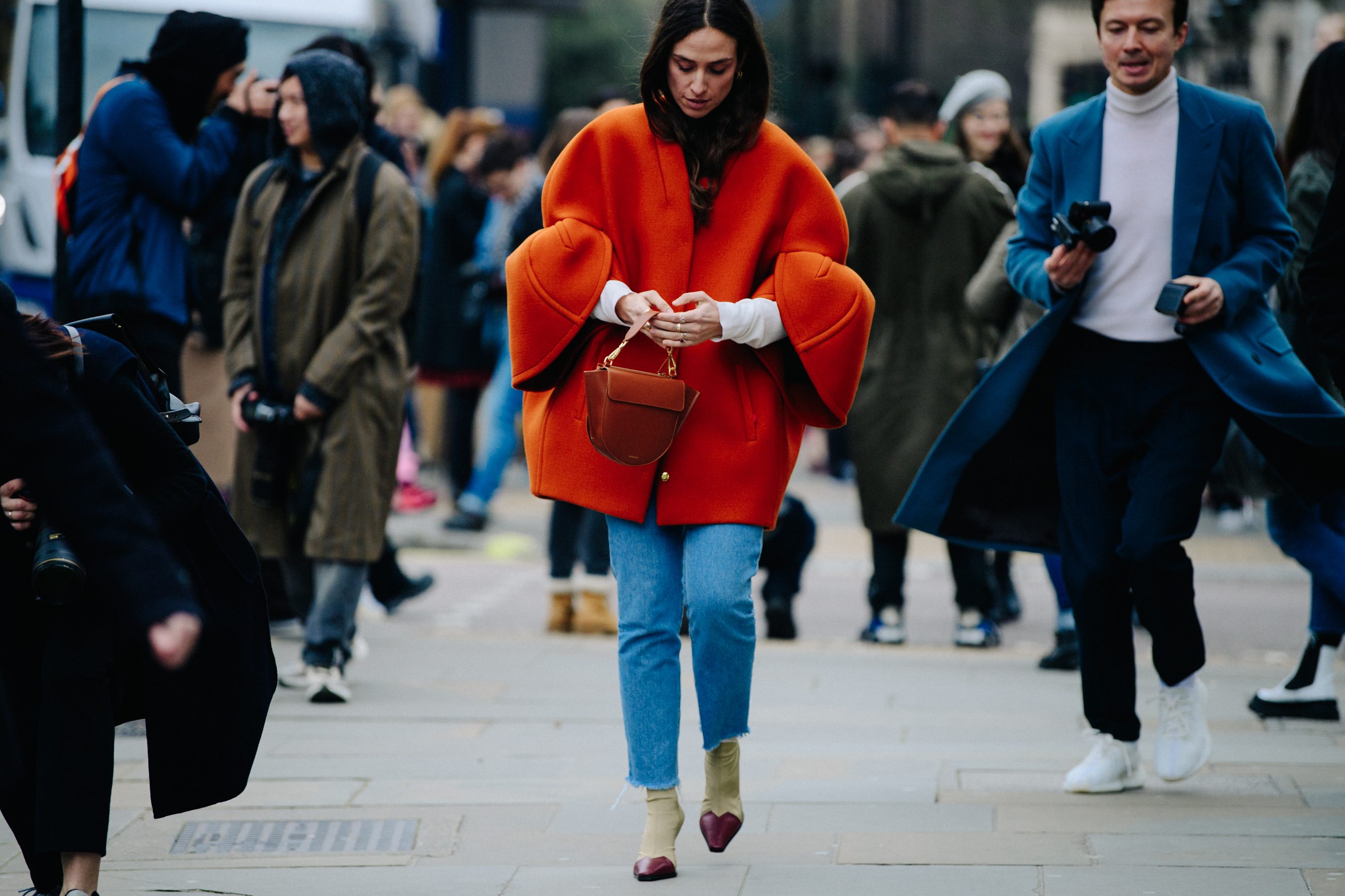 Woman wearing big red jacket