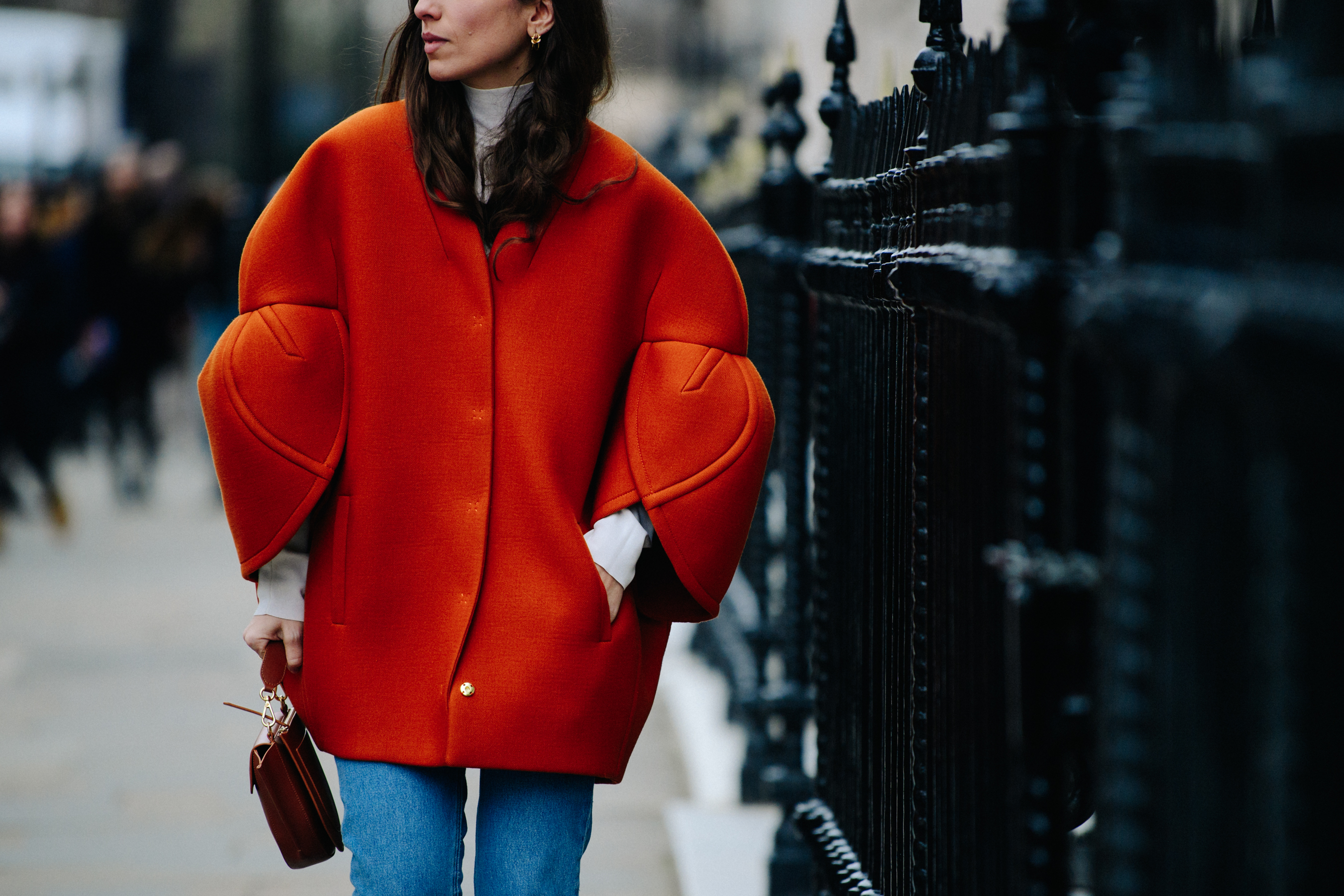 Woman wearing big red jacket