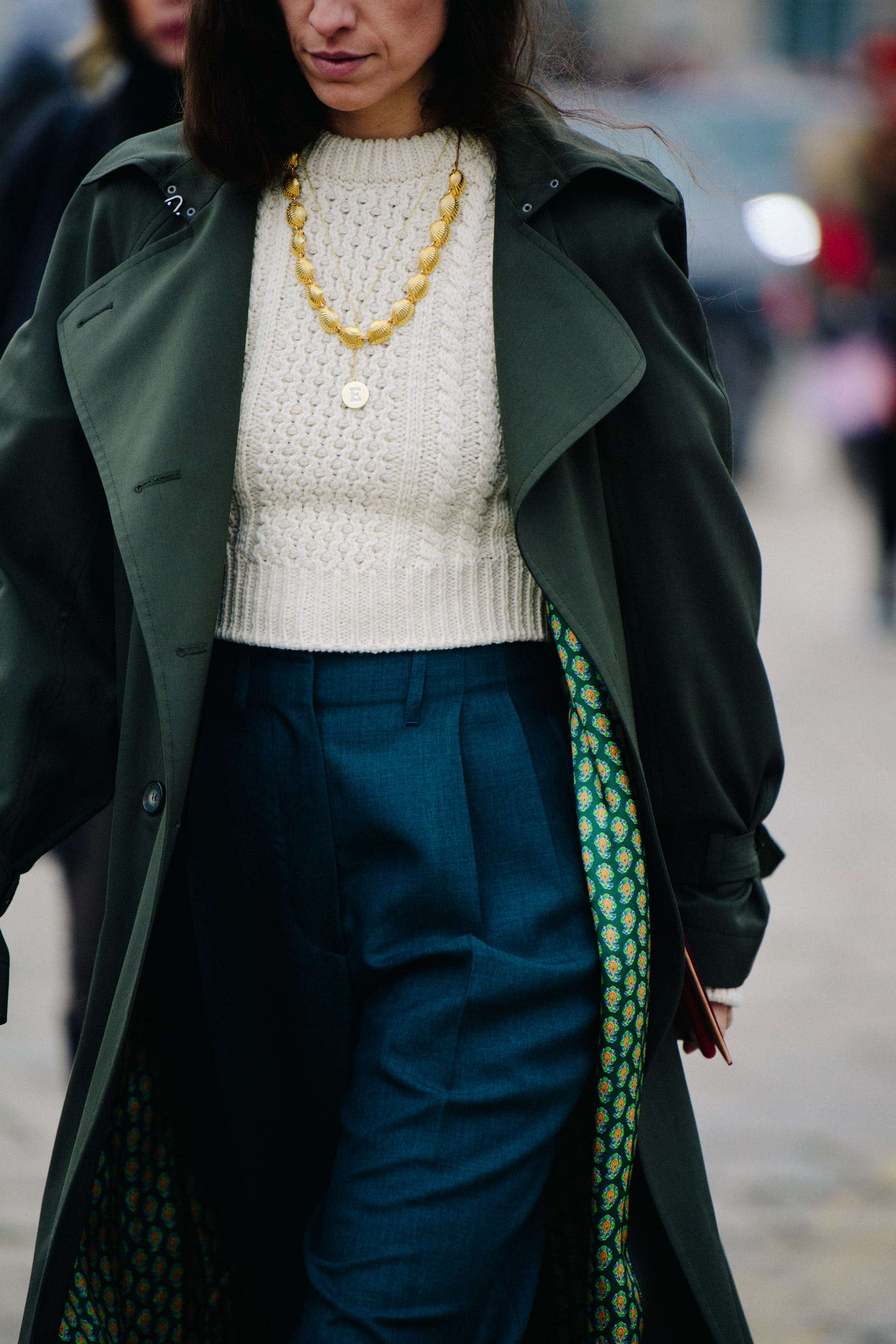Woman wearing white knit jumper