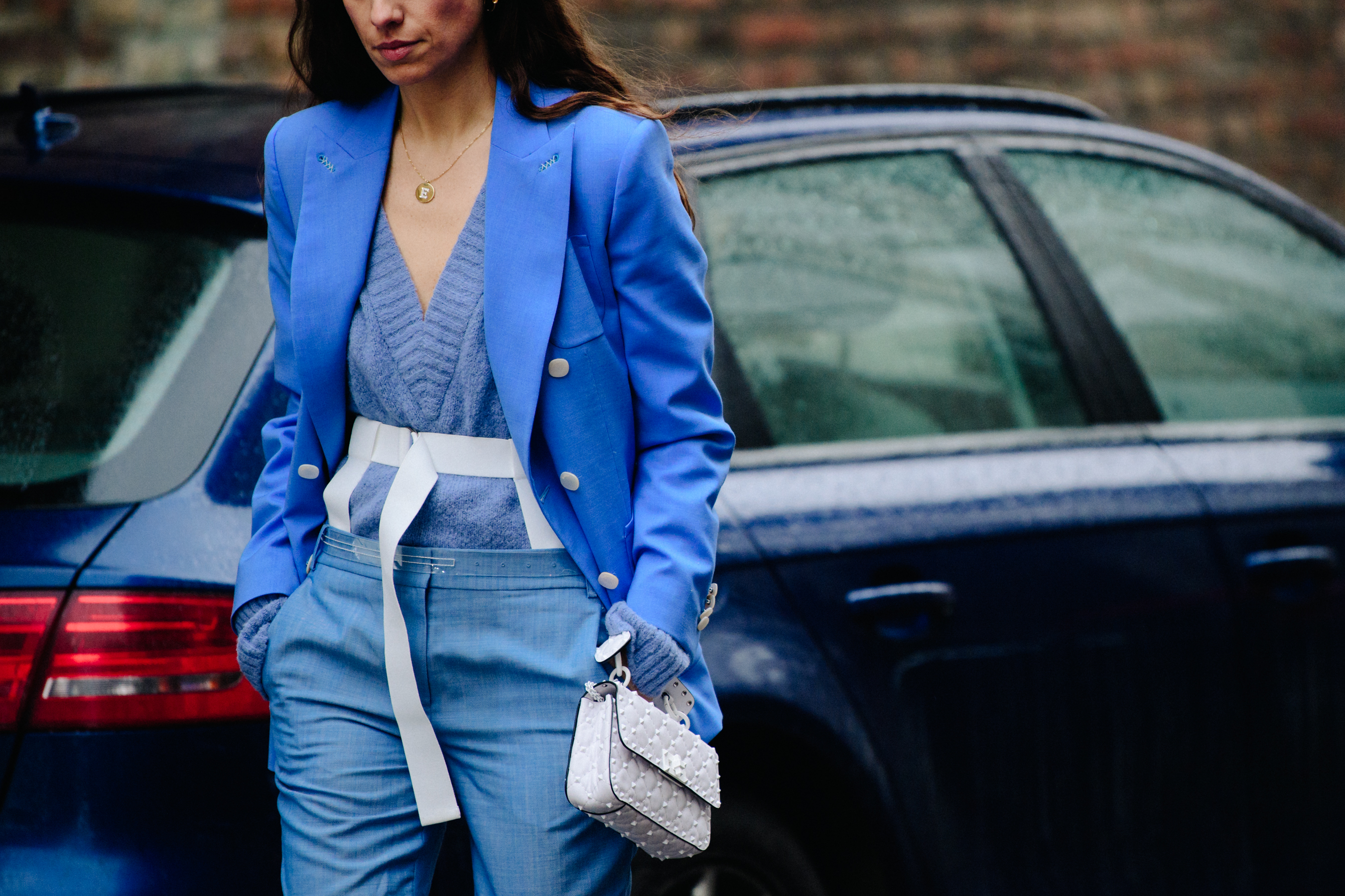 Italian woman wearing blue outfit