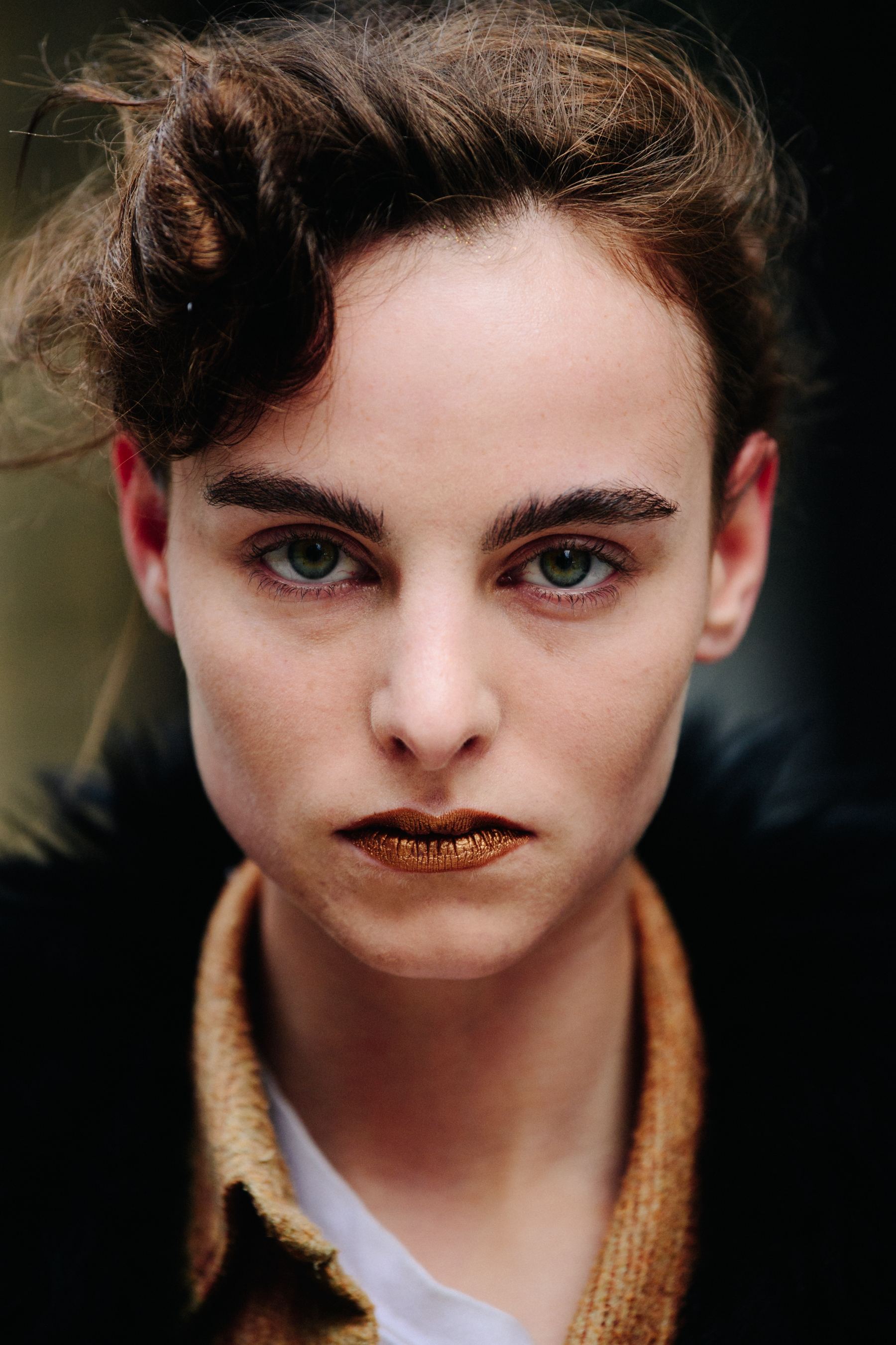 Portrait of Dutch model wearing gold lipstick