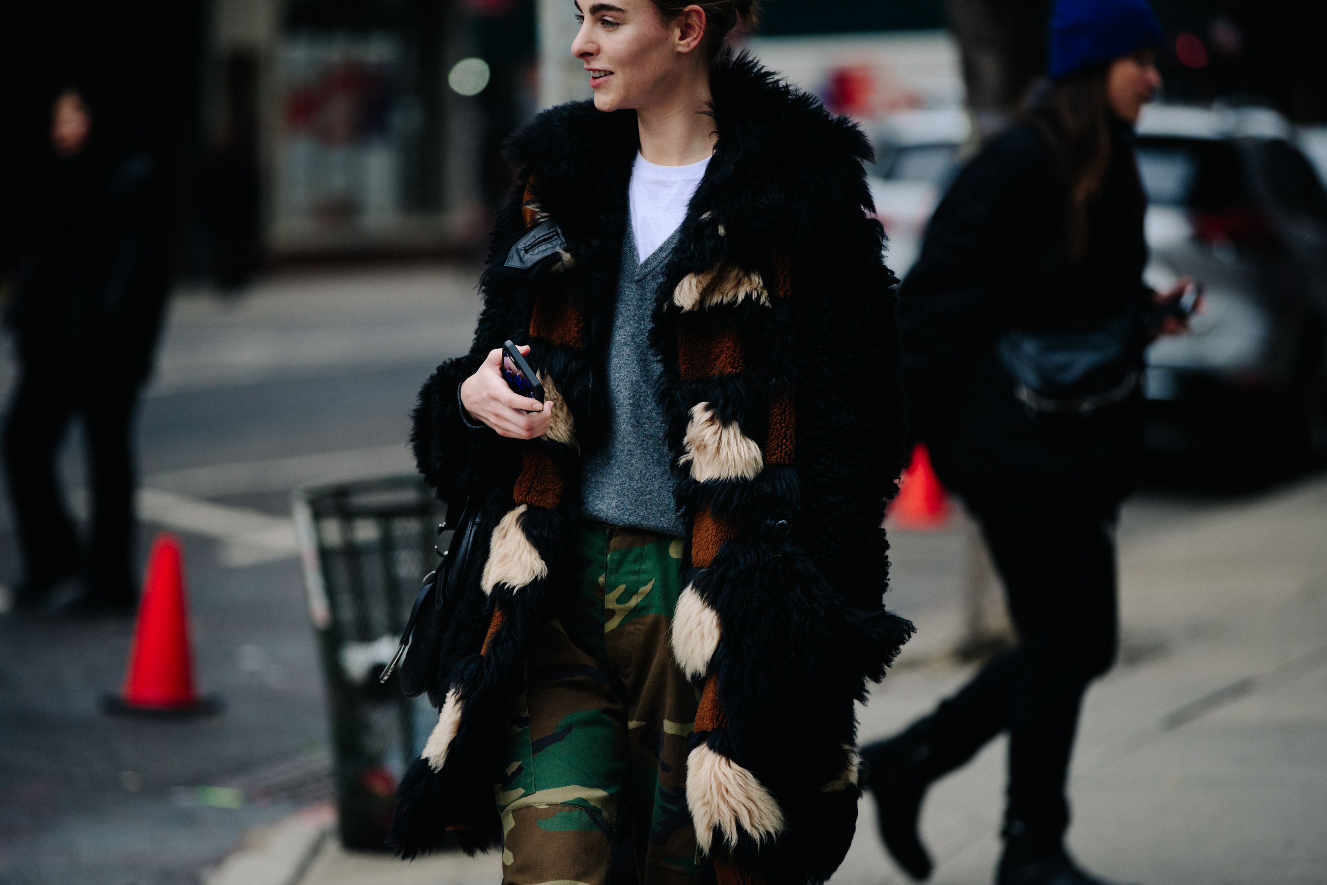 Model wearing camo pants