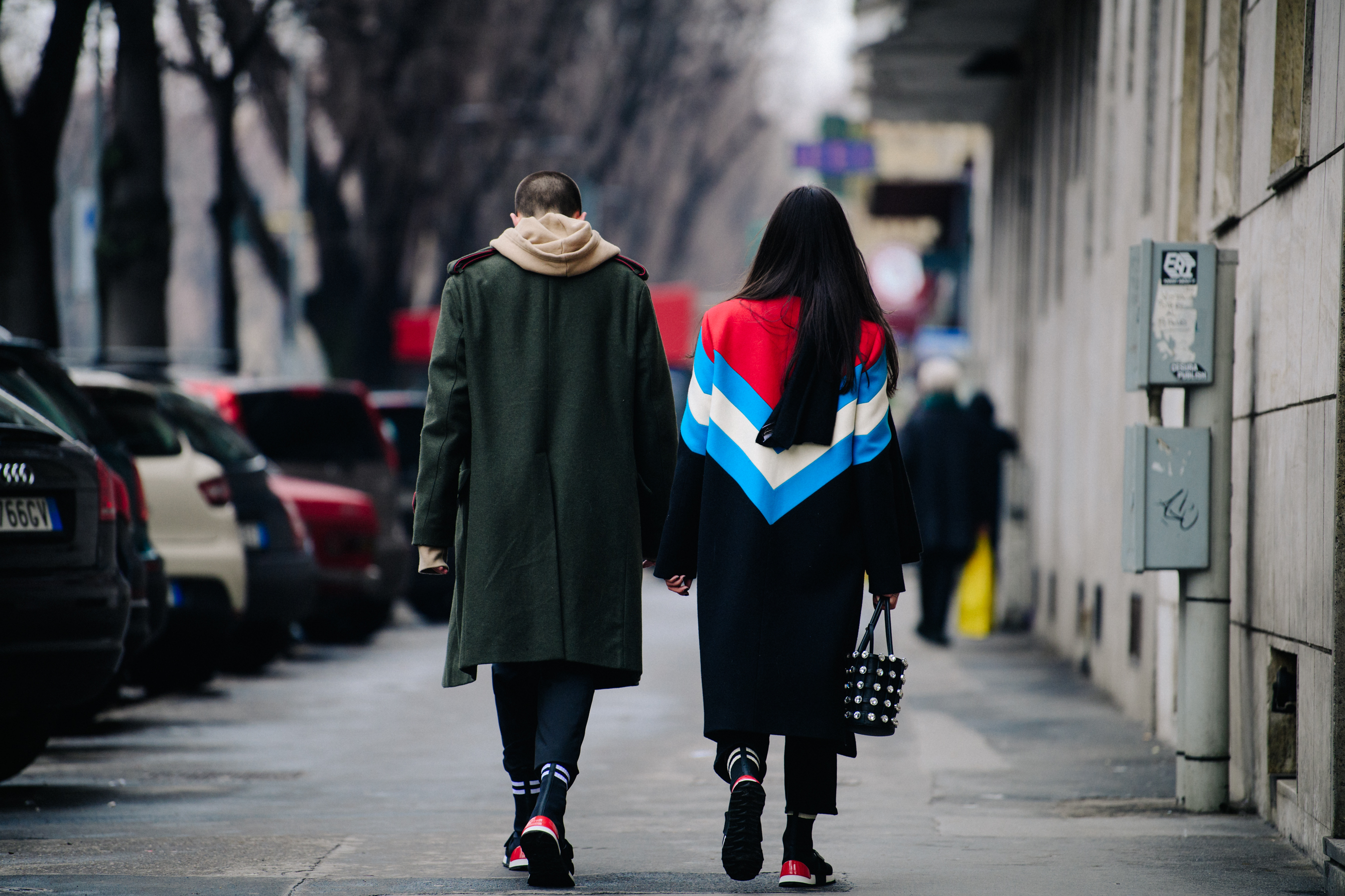 Couple wearing matching sneakers
