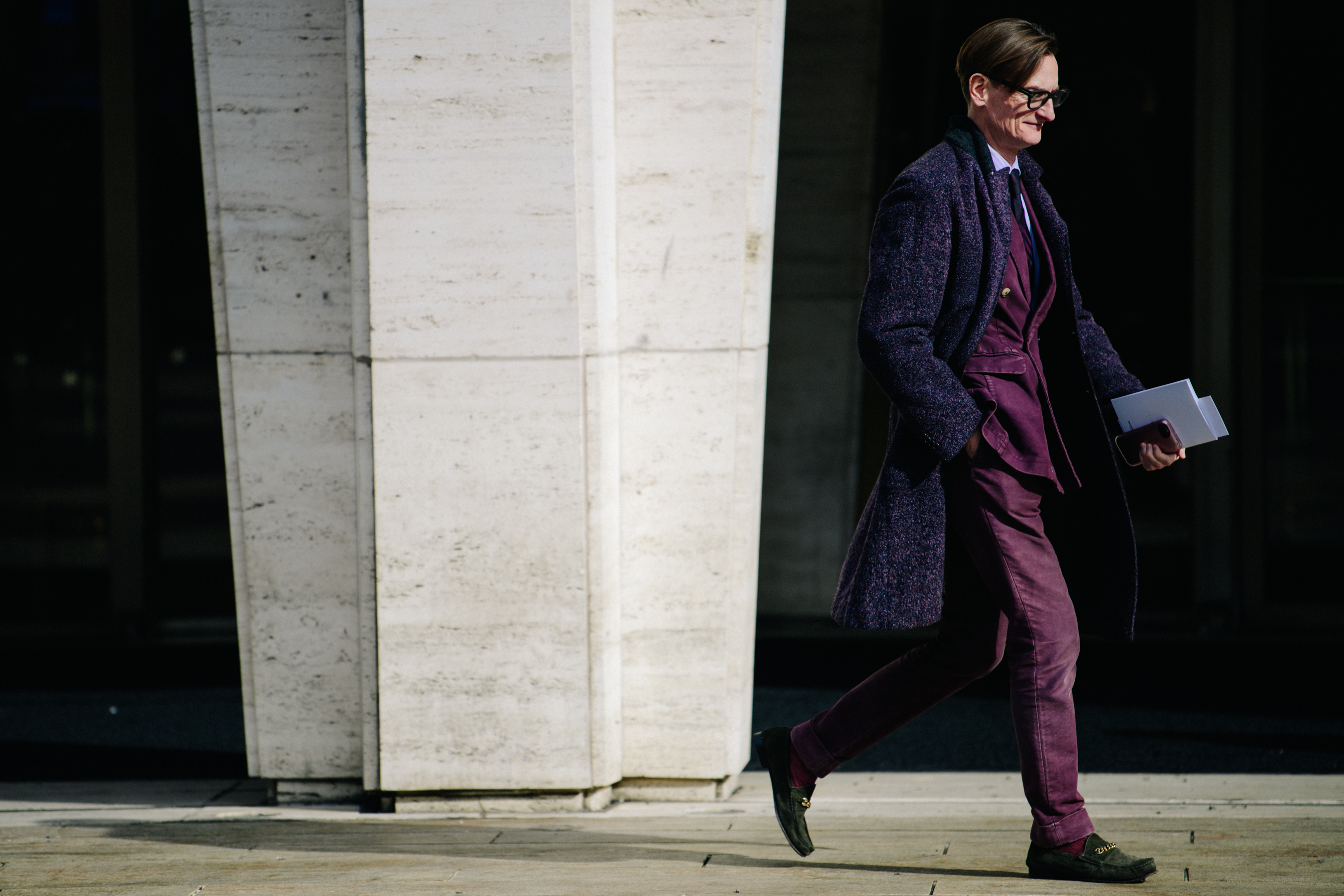 Man wearing purple outfit