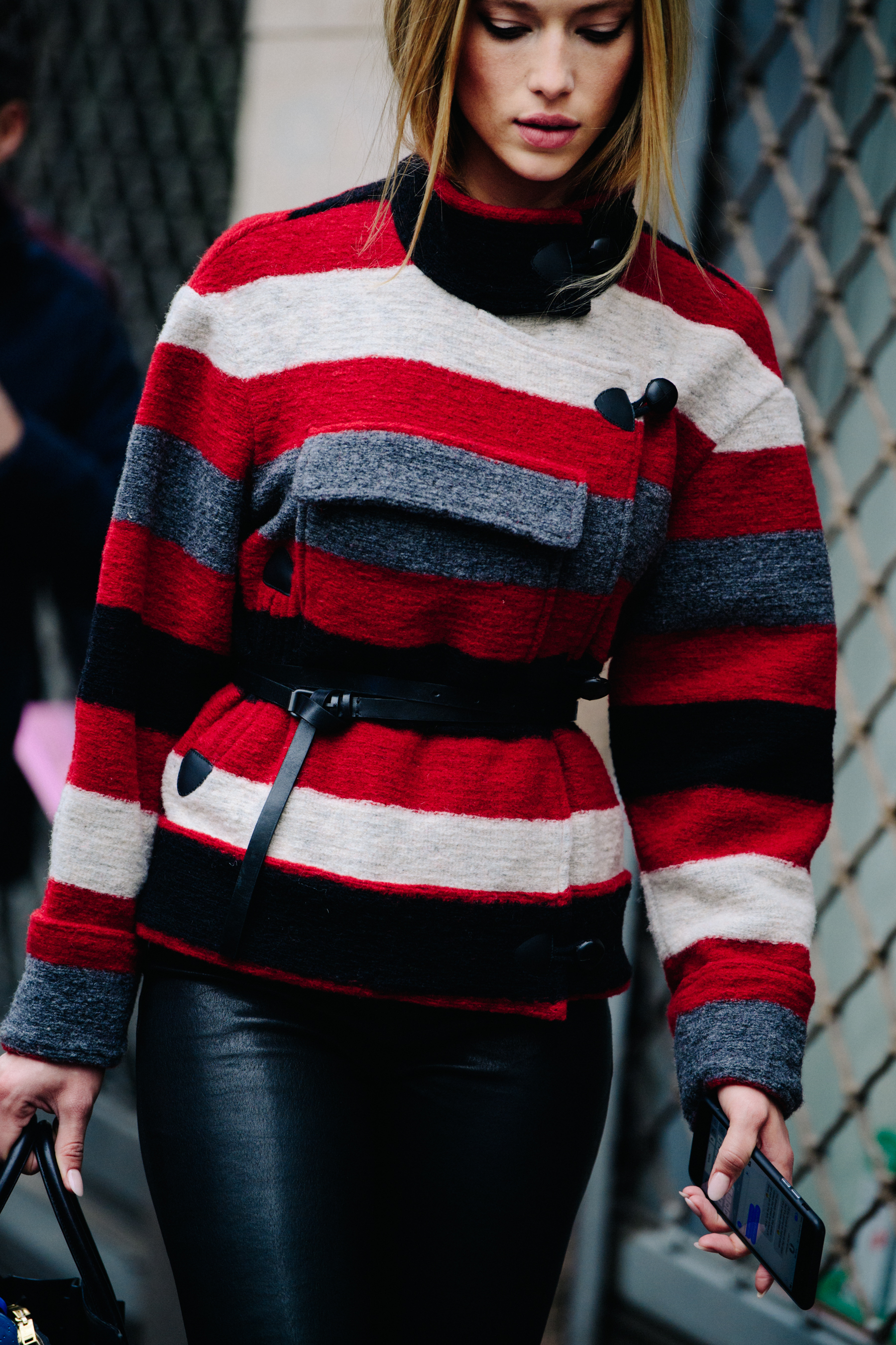 Model wearing red striped top
