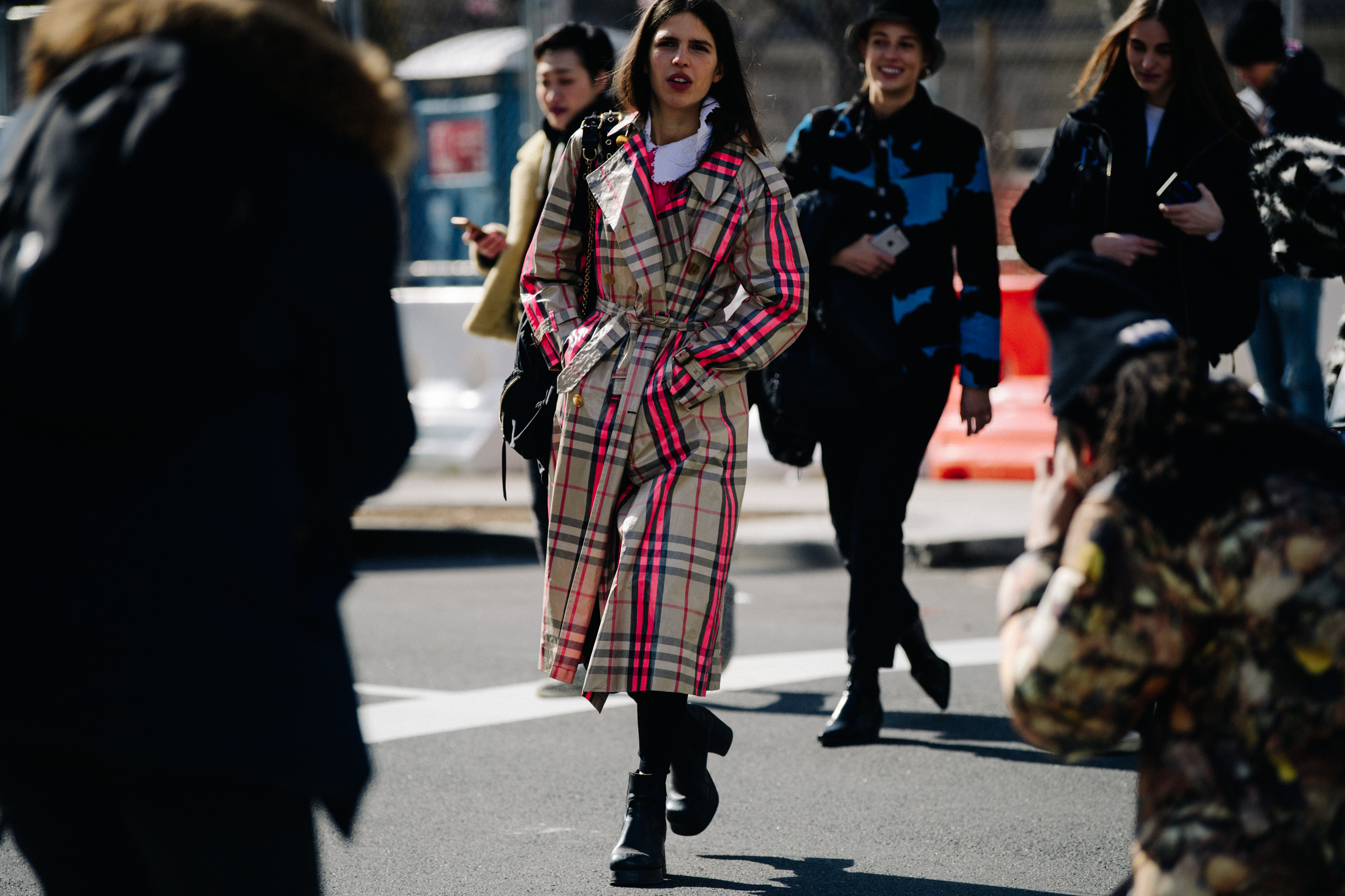 Model wearing pink Burberry coat