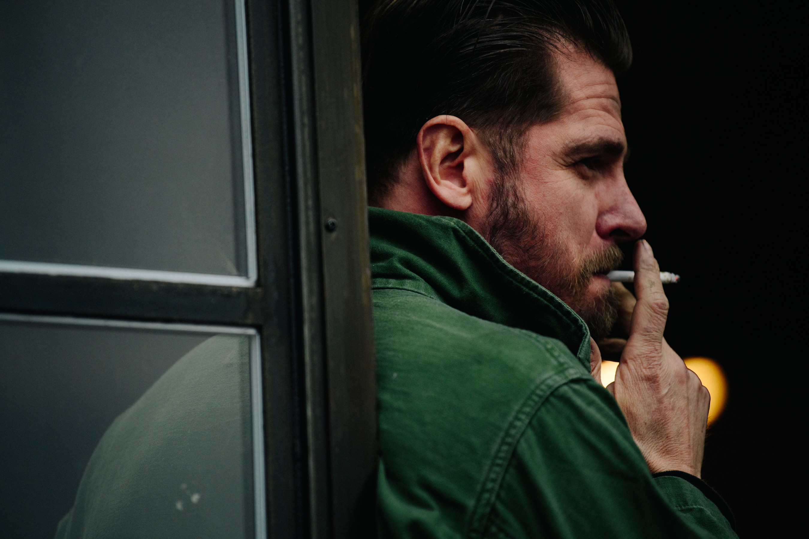 Man wearing green overalls