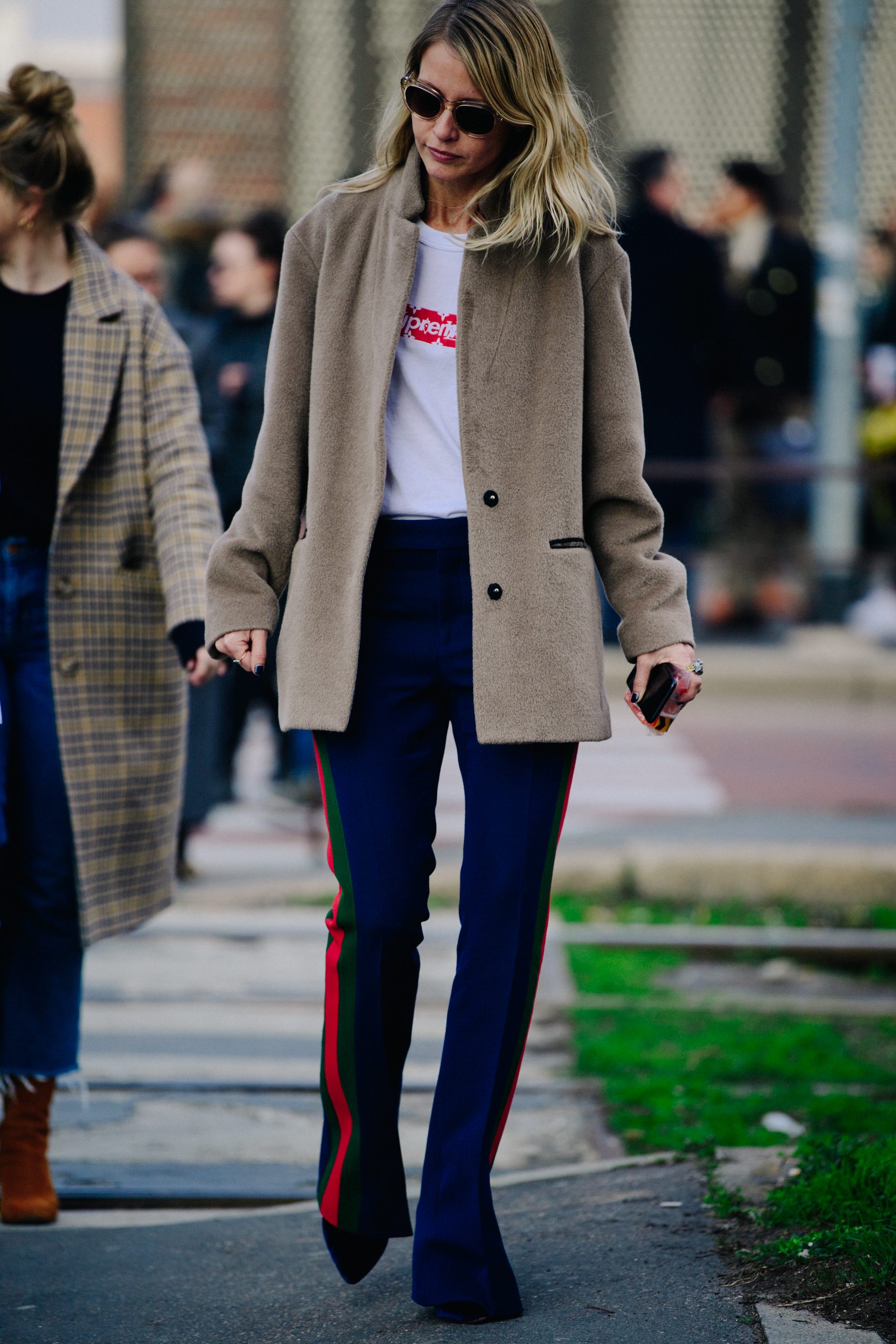 Women wearing Supreme x Louis Vuitton tee shirt
