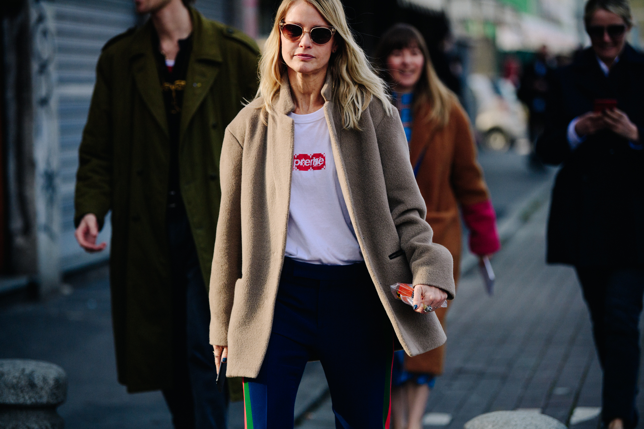 Women wearing Supreme x Louis Vuitton tee shirt