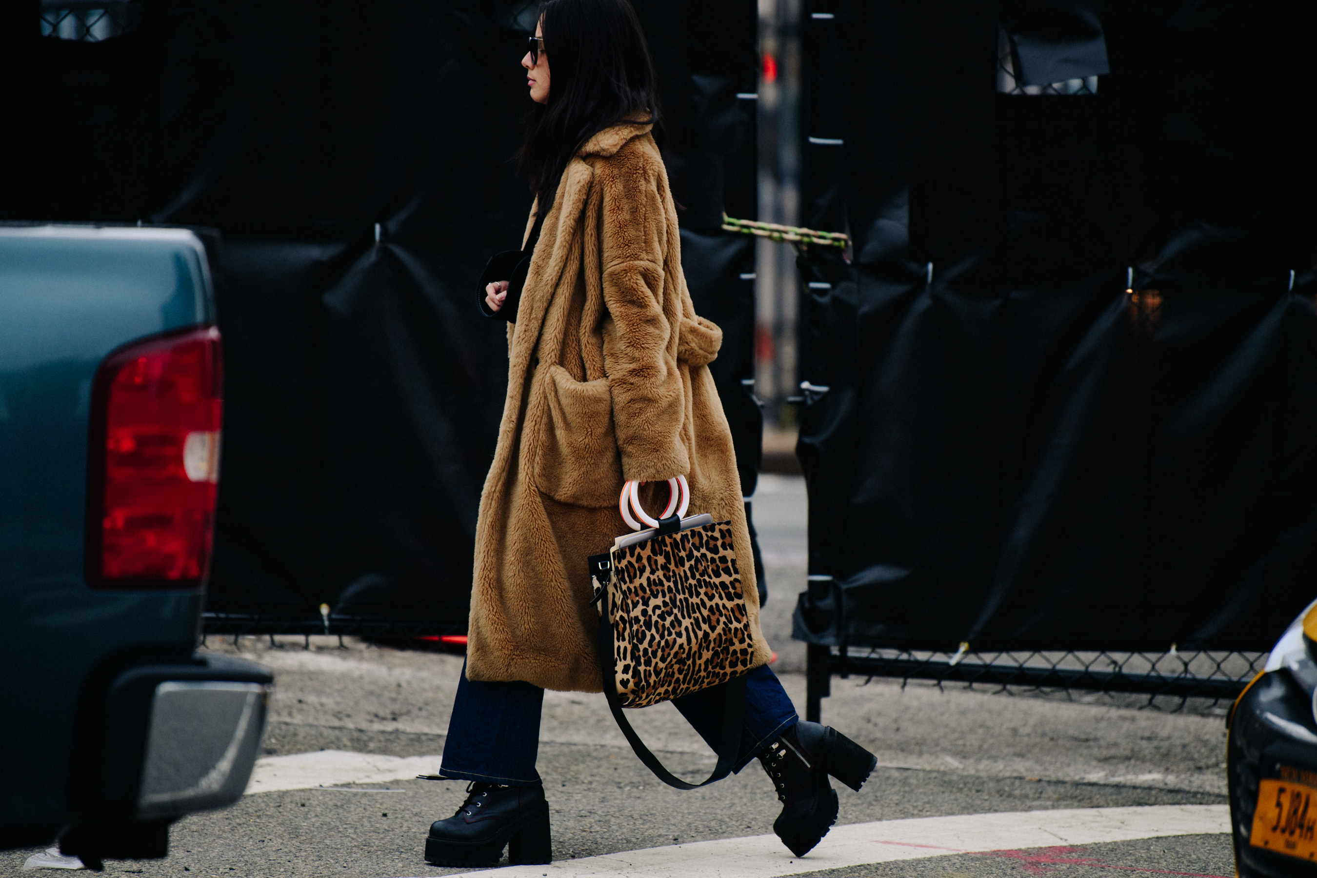 Woman carrying animal print bag