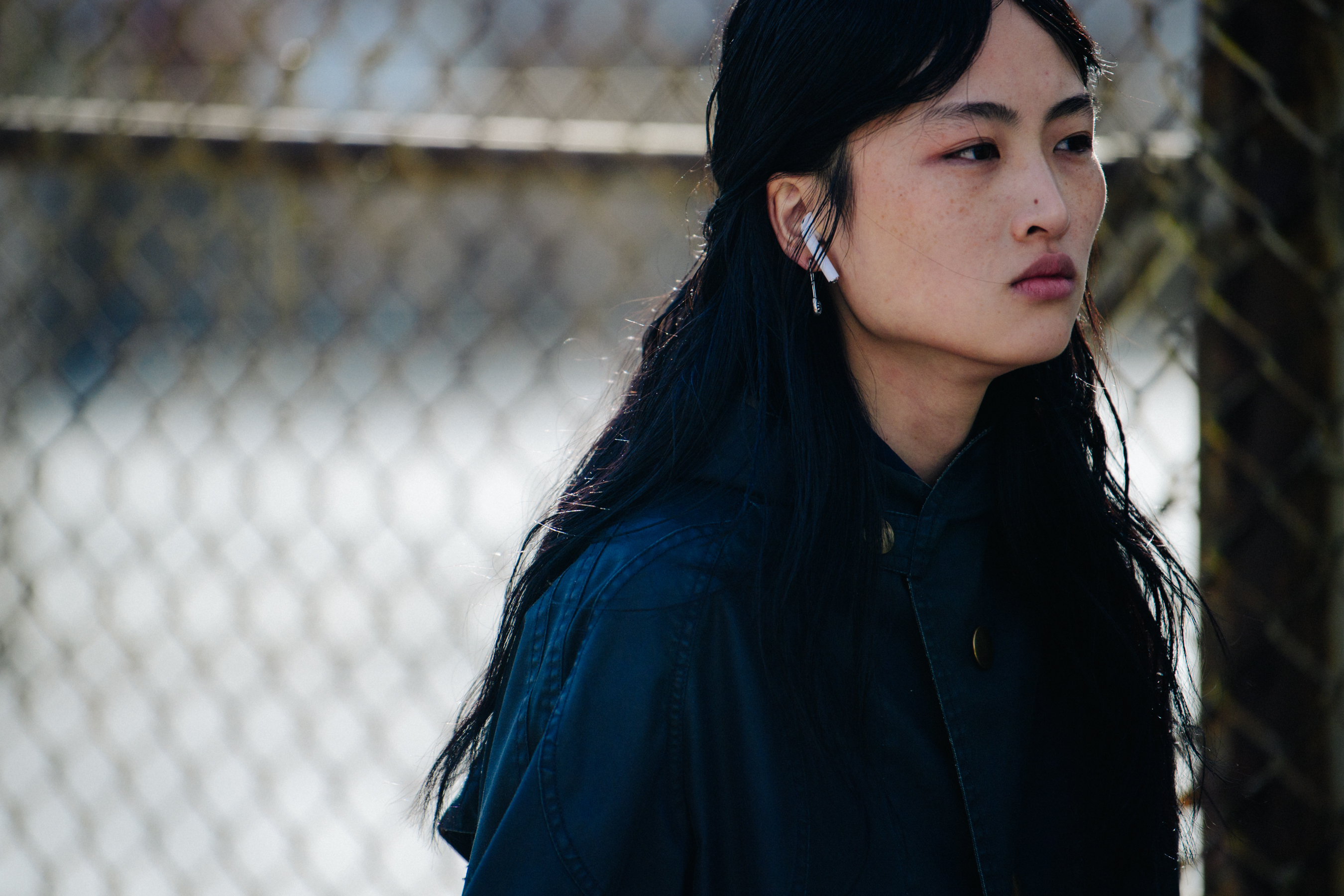 Model wearing Apple AirPods