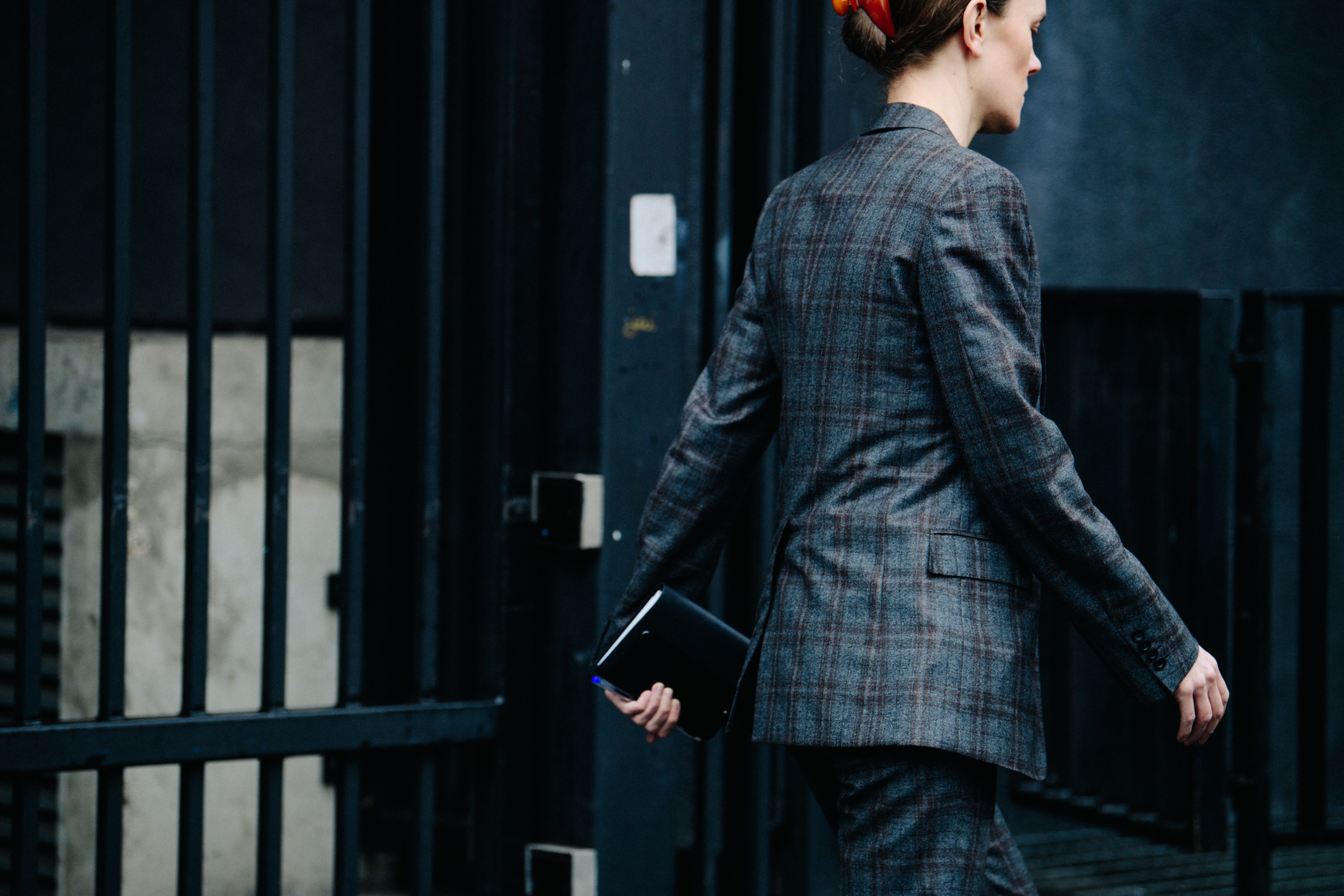 Editor wearing grey suit