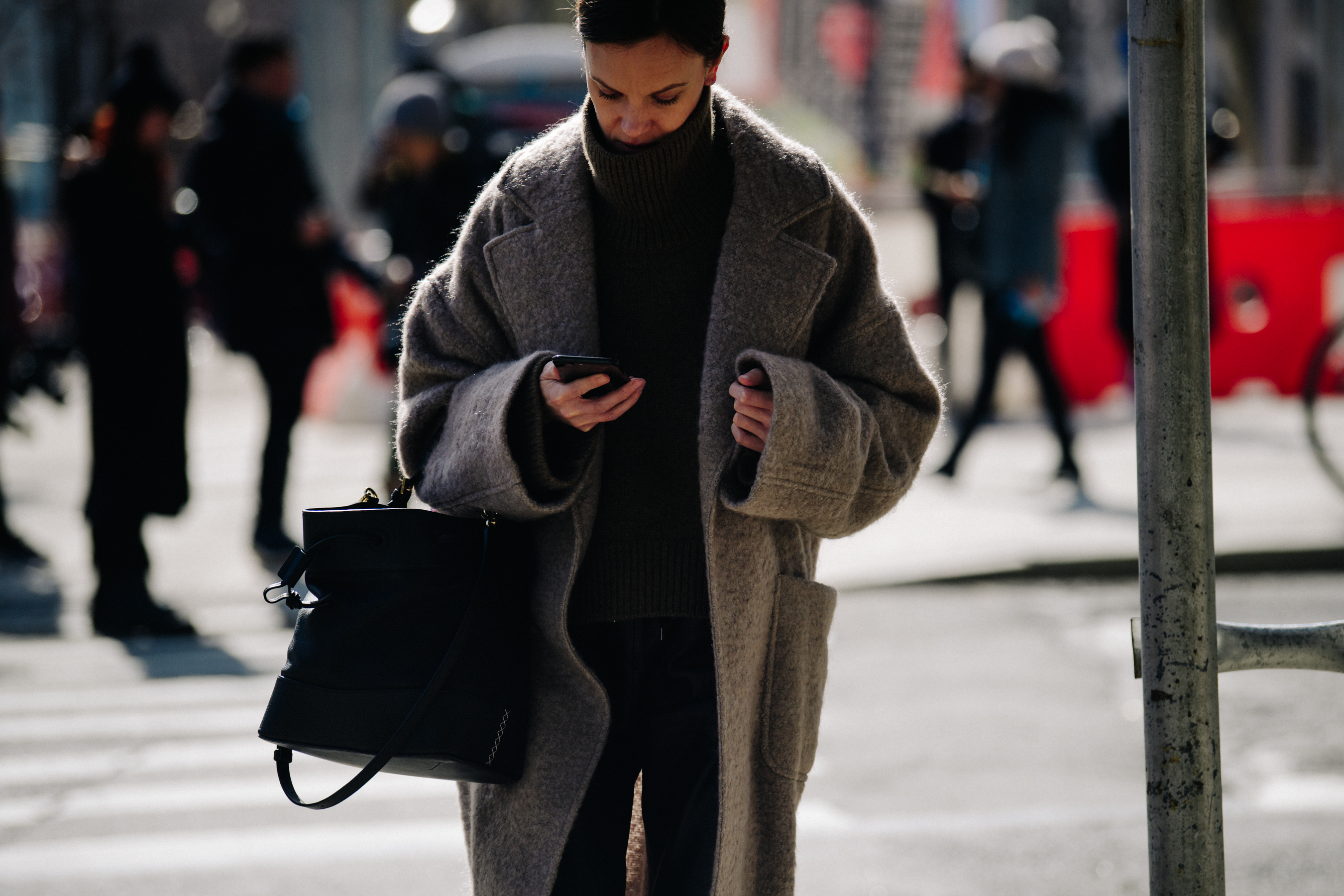 Editor wearing dark wool coat
