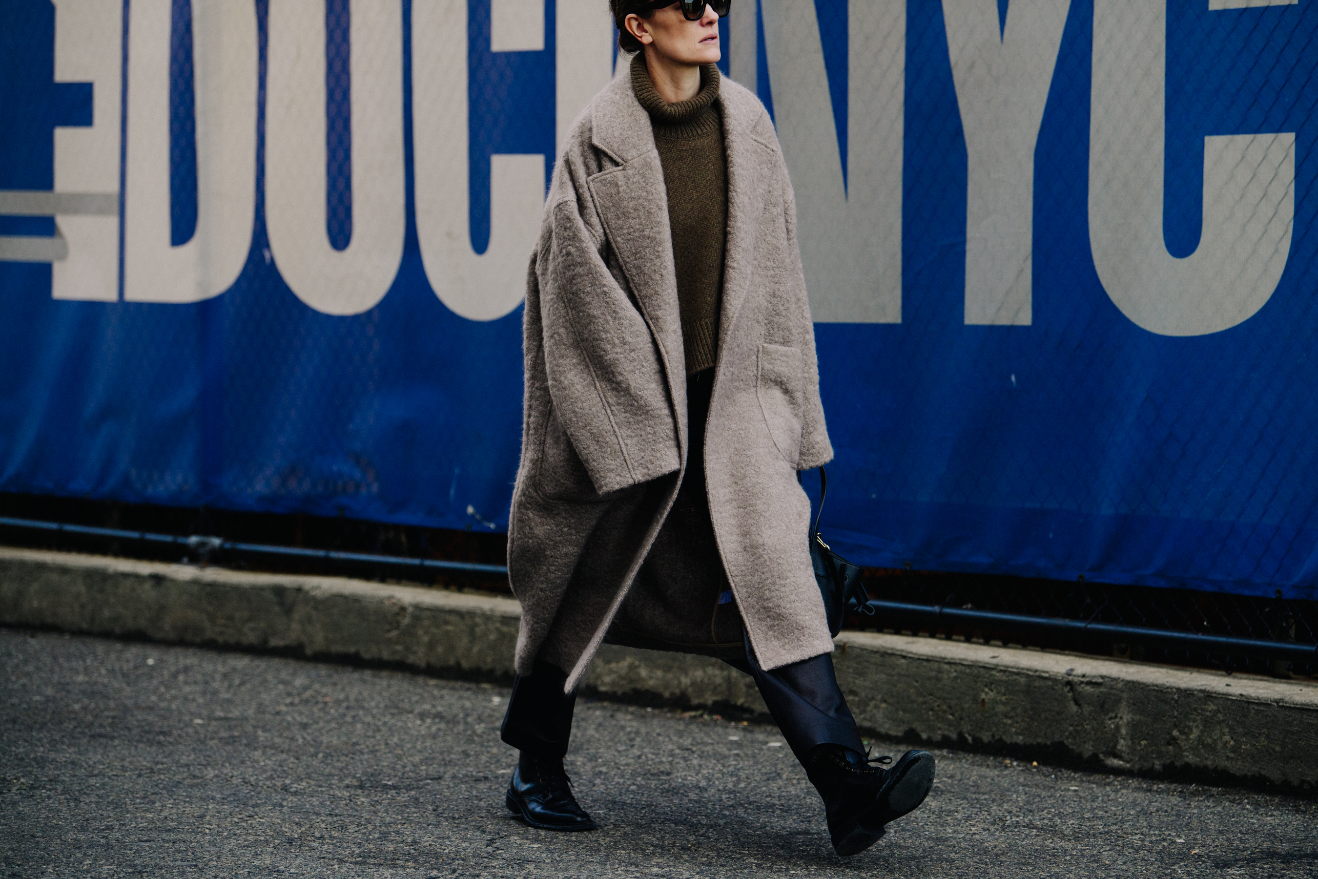 Woman wearing long wool coat