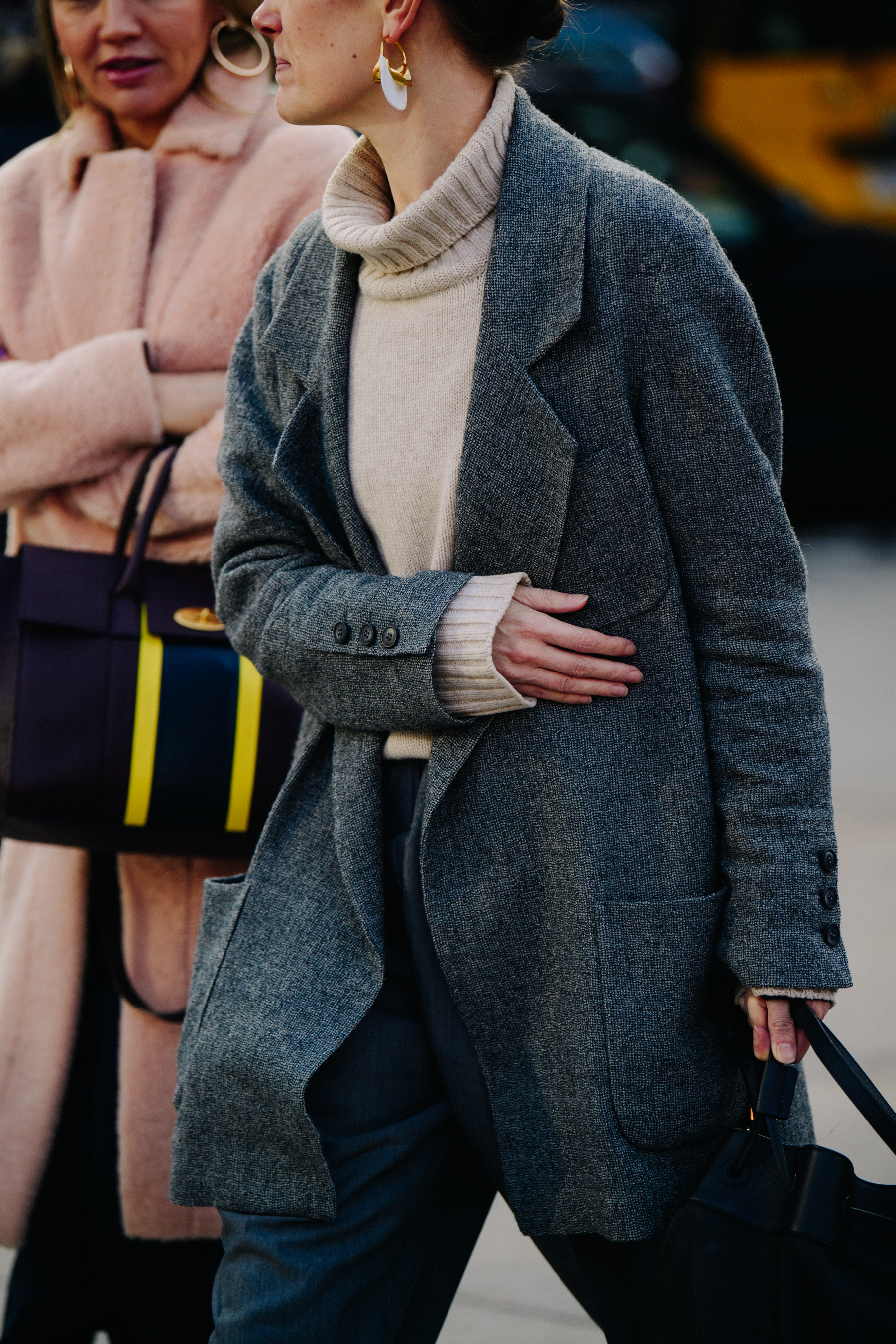 Woman wearing grey coat