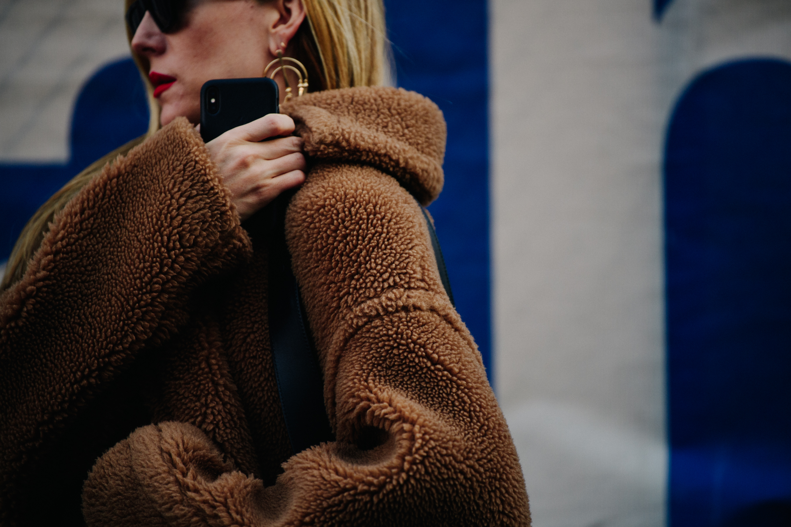 Woman wearing brown fur coat