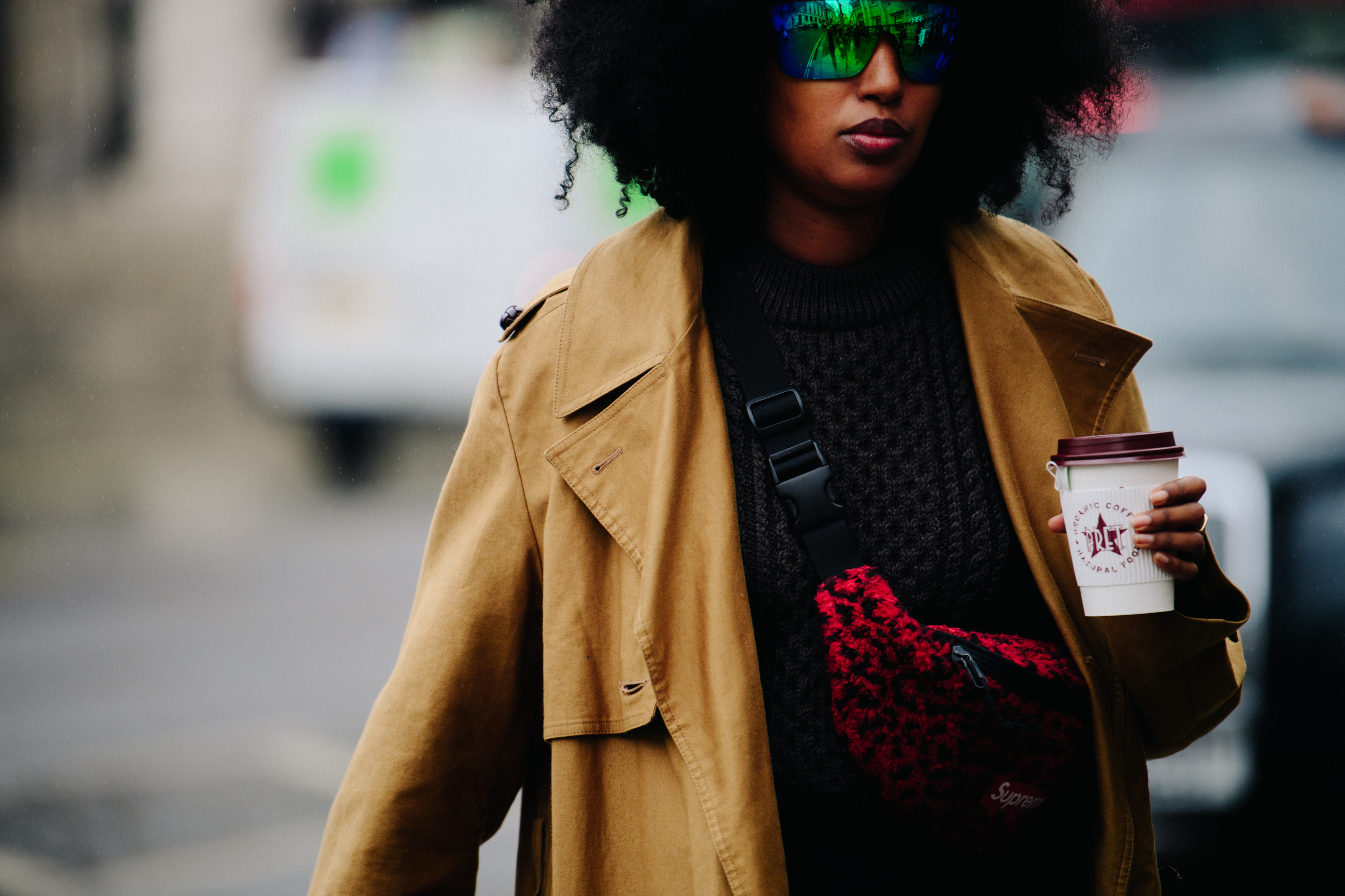 Woman wearing Supreme hip bag