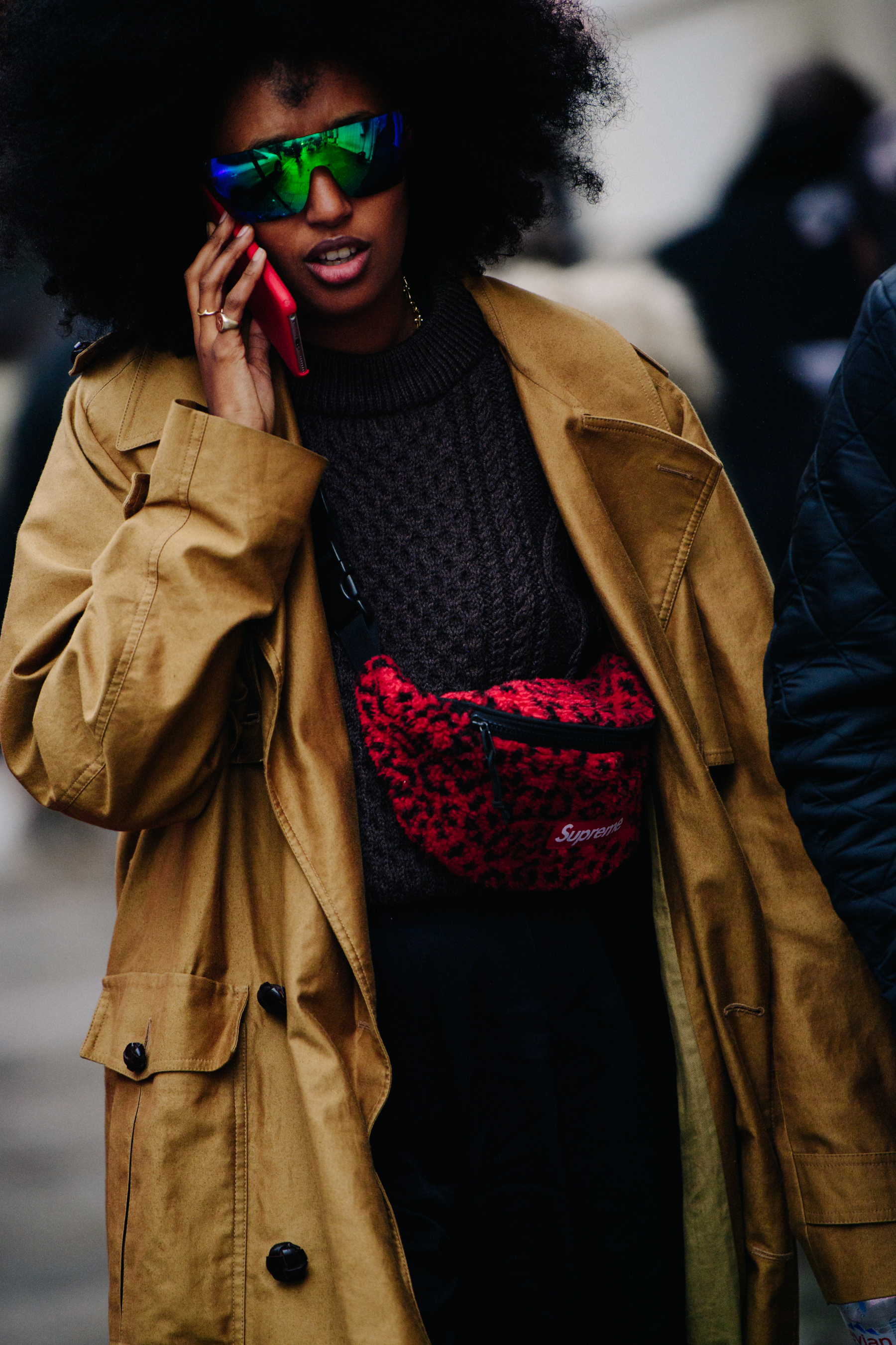 Woman wearing colourful sunglasses